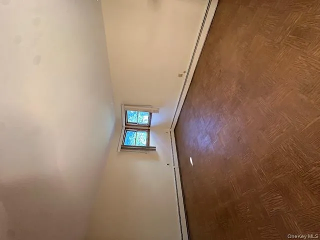 Empty room featuring a baseboard radiator Empty room featuring a baseboard radiator