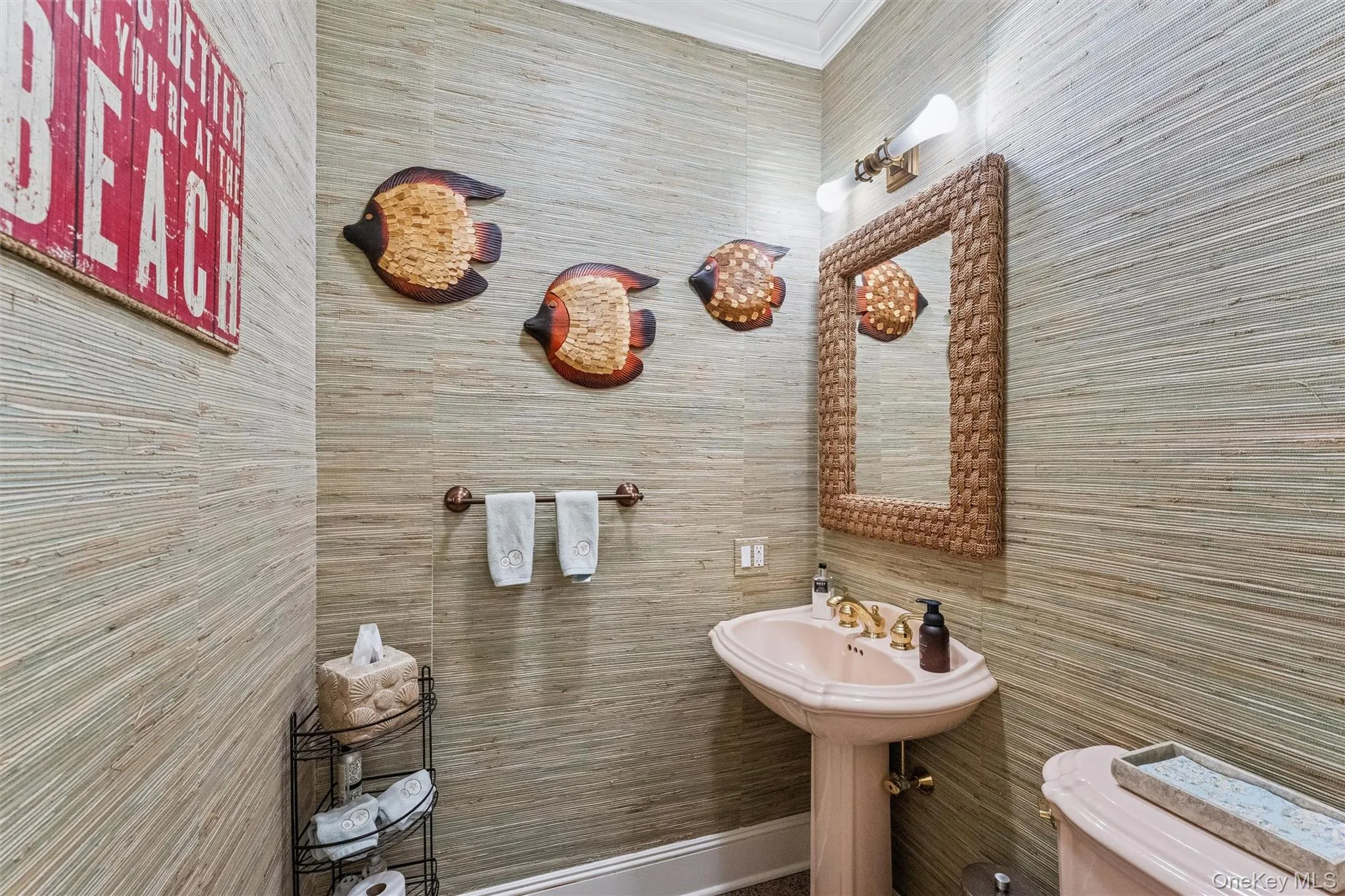 Half bath with toilet and crown molding Half bath with toilet and crown molding