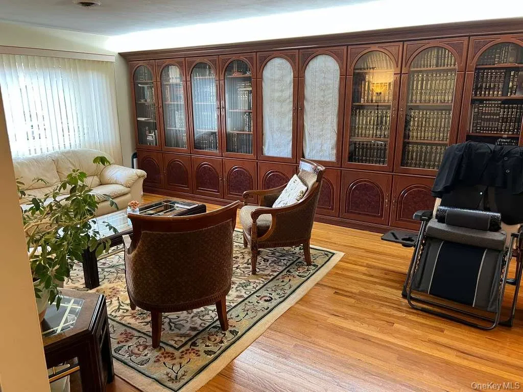 Living area with light wood-style floors Living area with light wood-style floors