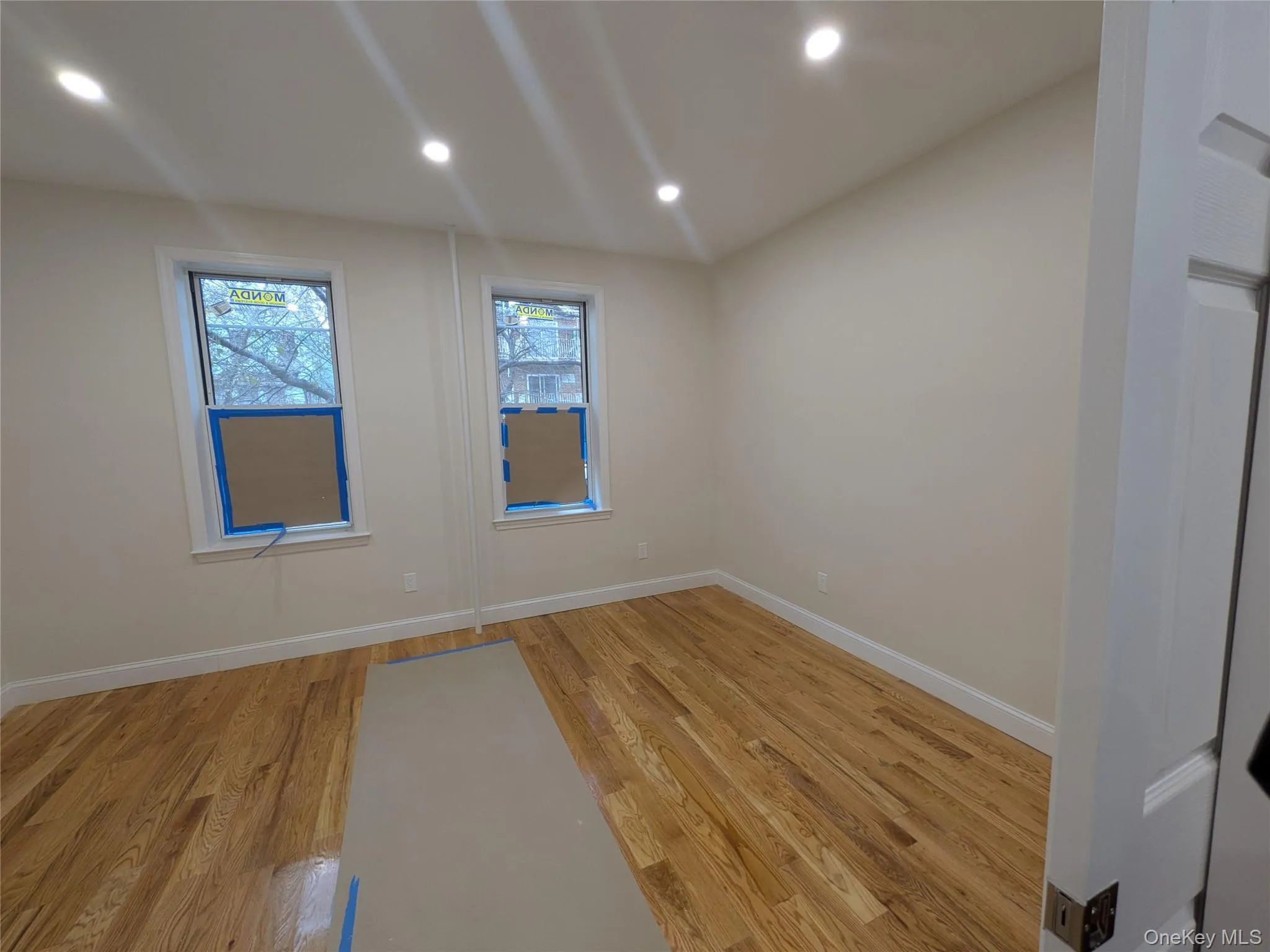 Unfurnished room featuring recessed lighting and light wood-type flooring Unfurnished room featuring recessed lighting and light wood-type flooring