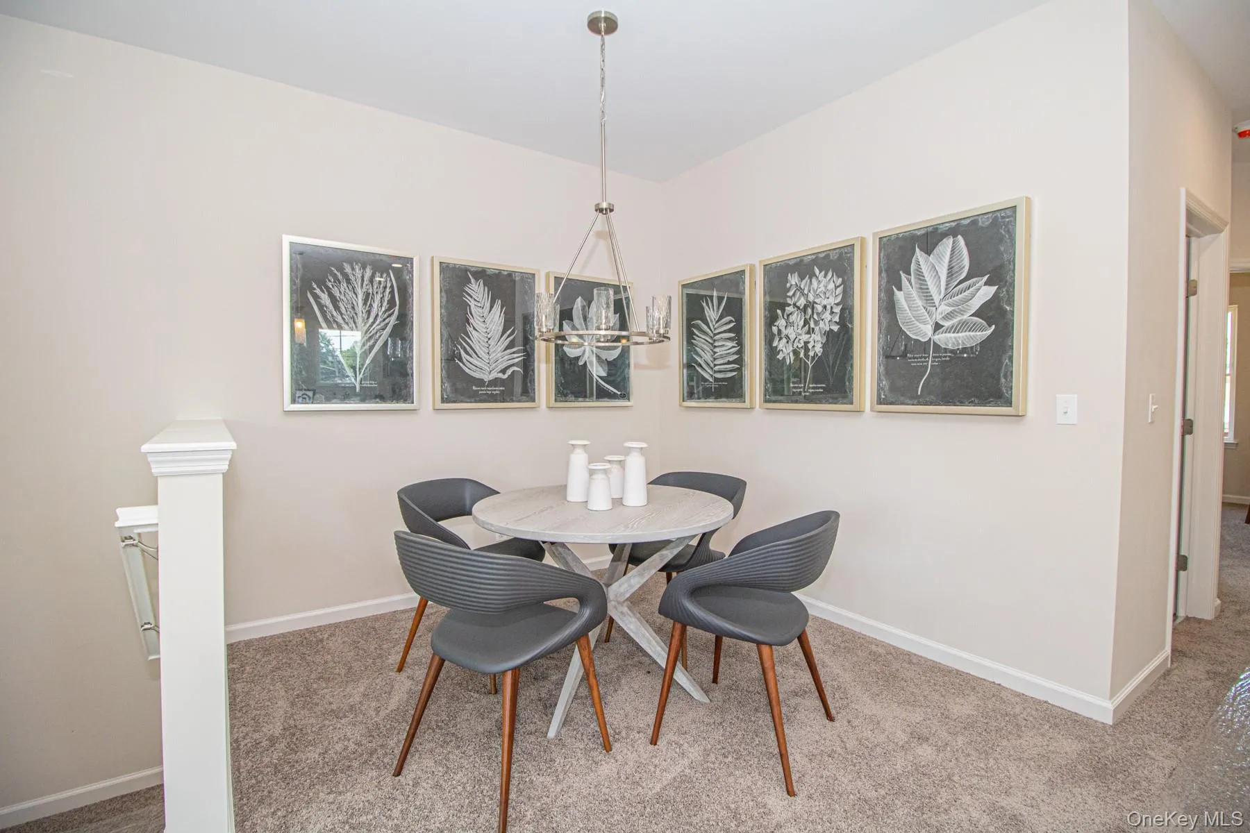 Dining room featuring carpet floors Dining room featuring carpet floors