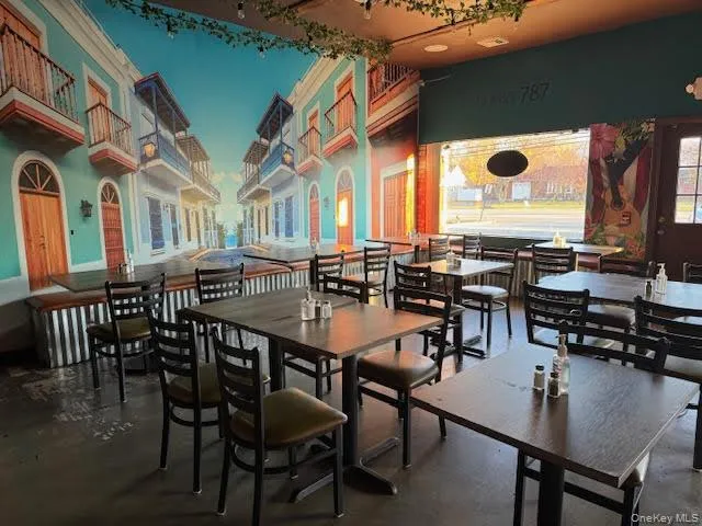 Dining area with concrete flooring Dining area with concrete flooring