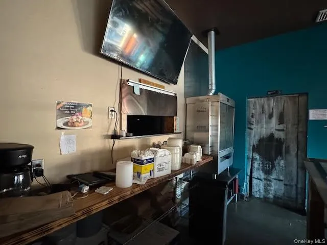 Kitchen featuring finished concrete floors Kitchen featuring finished concrete floors