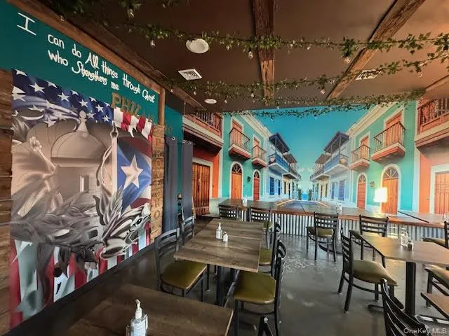 Dining space featuring finished concrete floors Dining space featuring finished concrete floors