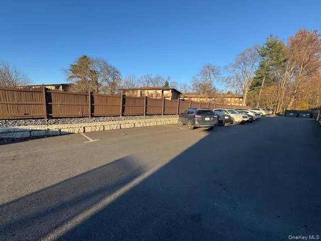 View of uncovered parking lot View of uncovered parking lot