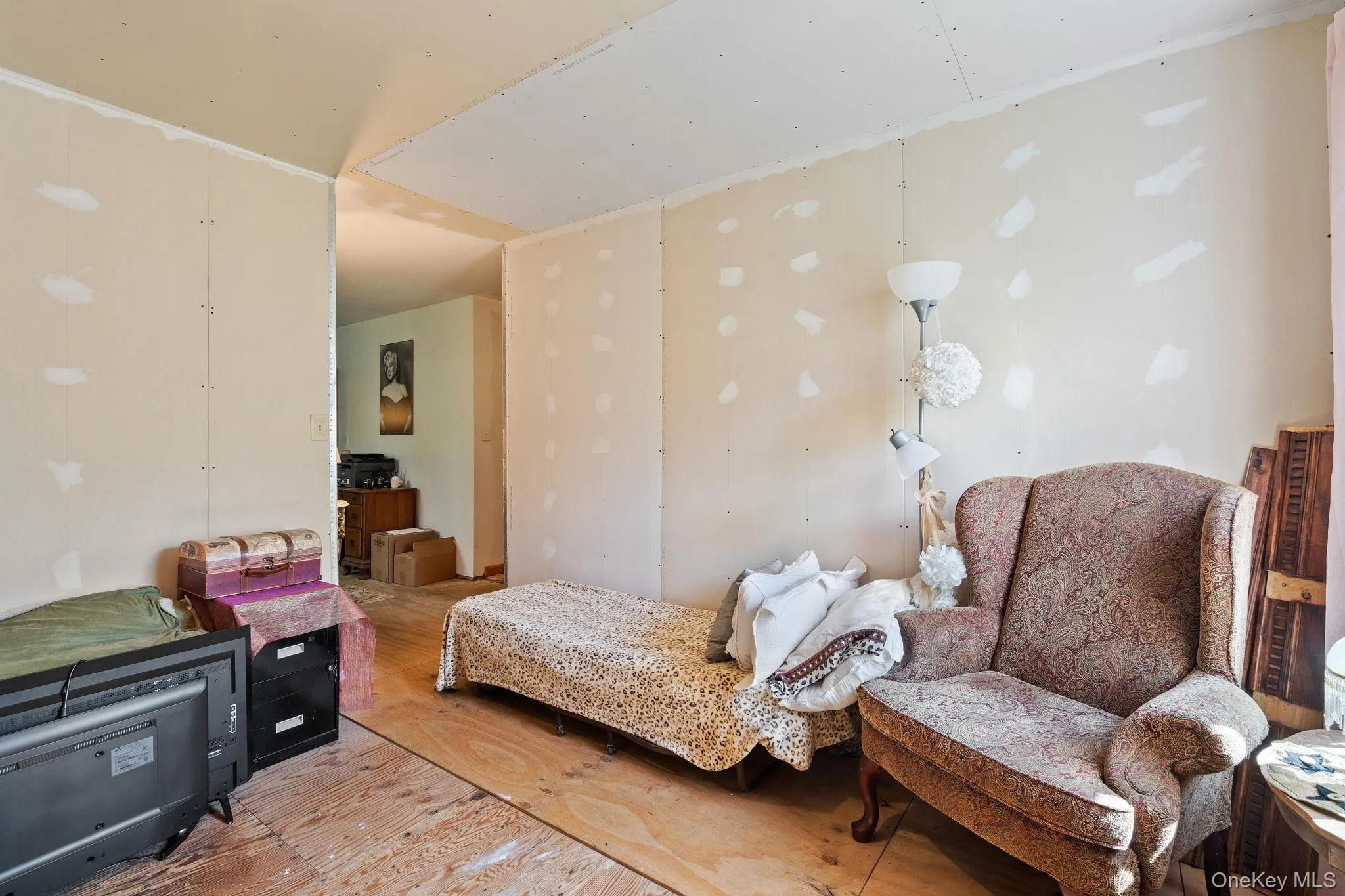 Bedroom featuring hardwood / wood-style flooring Bedroom featuring hardwood / wood-style flooring