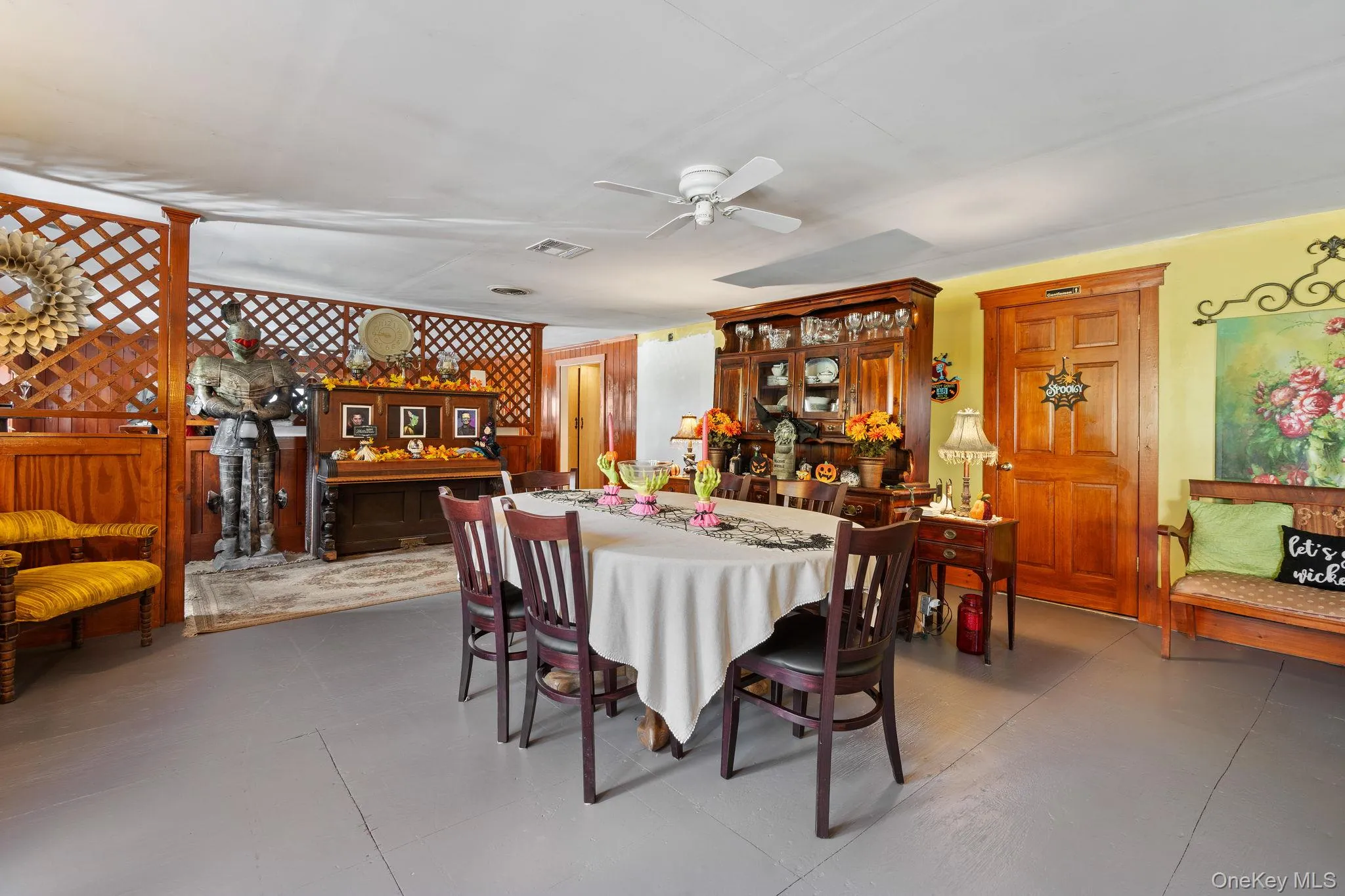 Dining area with ceiling fan and tile patterned floors Dining area with ceiling fan and tile patterned floors