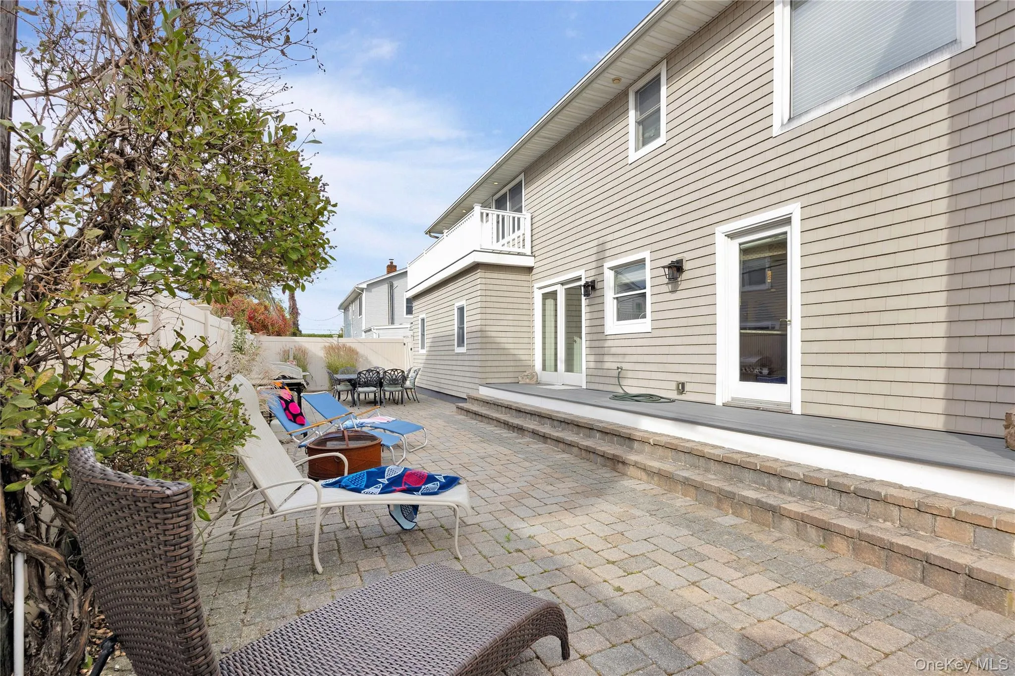 Patio / terrace featuring a patio area and a fenced backyard Patio / terrace featuring a patio area and a fenced backyard