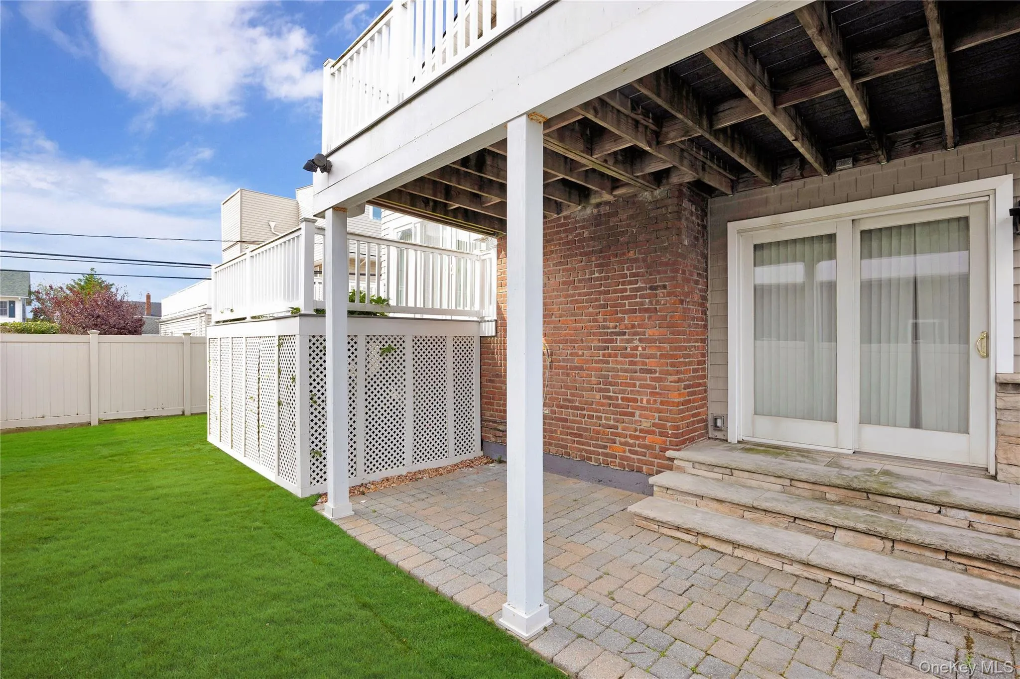 View of patio / terrace featuring a wooden deck View of patio / terrace featuring a wooden deck