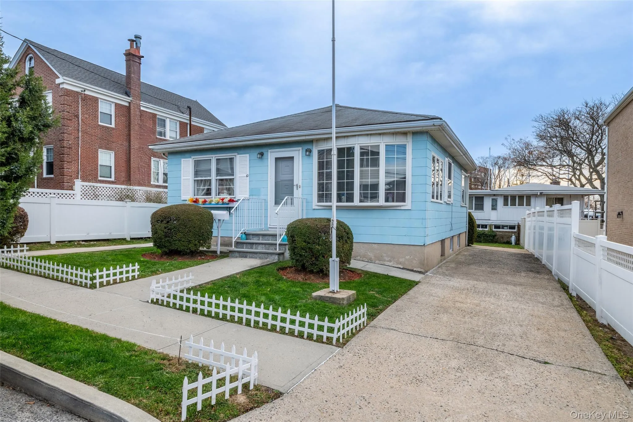 Bungalow-style house featuring a fenced front yard Bungalow-style house featuring a fenced front yard