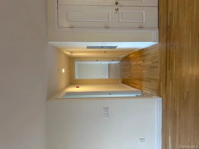 Corridor with light wood finished floors Corridor with light wood finished floors