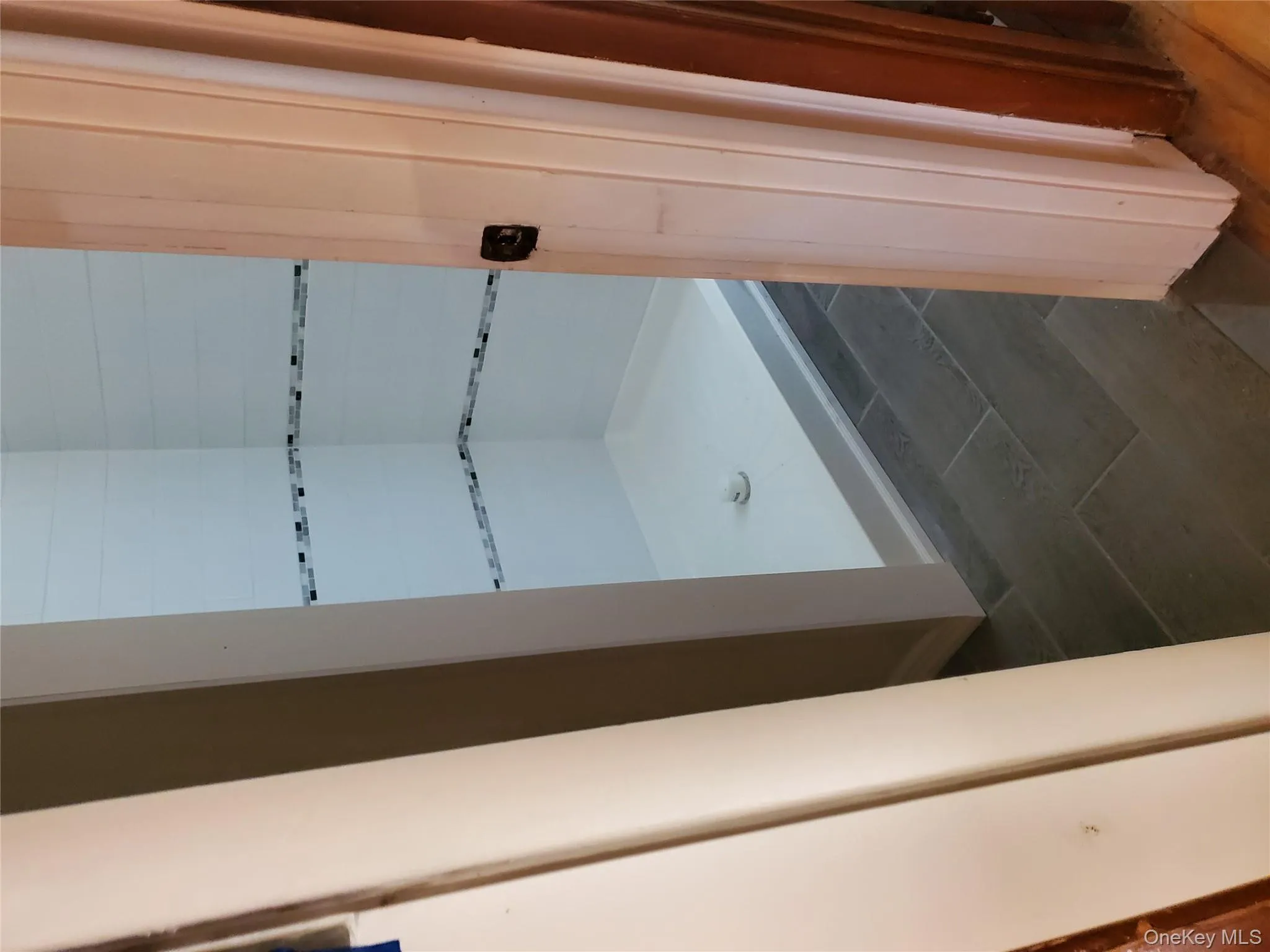 Full bathroom featuring a stall shower Full bathroom featuring a stall shower