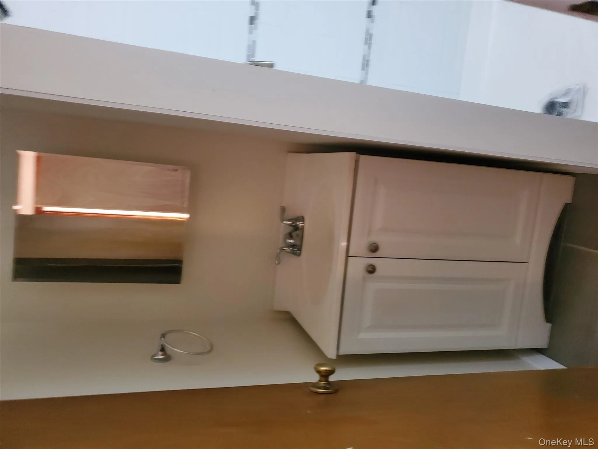 Bathroom featuring vanity and tile patterned floors Bathroom featuring vanity and tile patterned floors