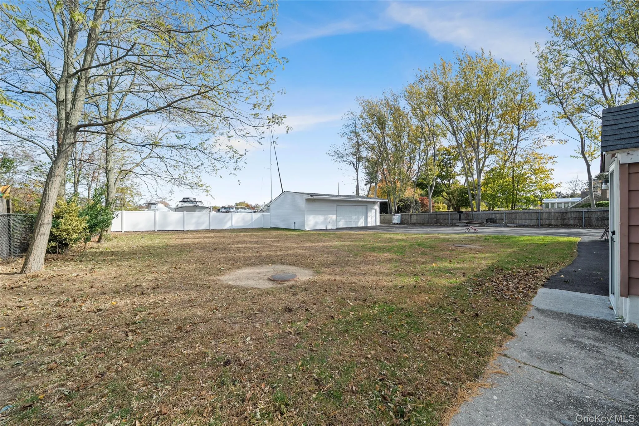 View of yard featuring an outbuilding View of yard featuring an outbuilding