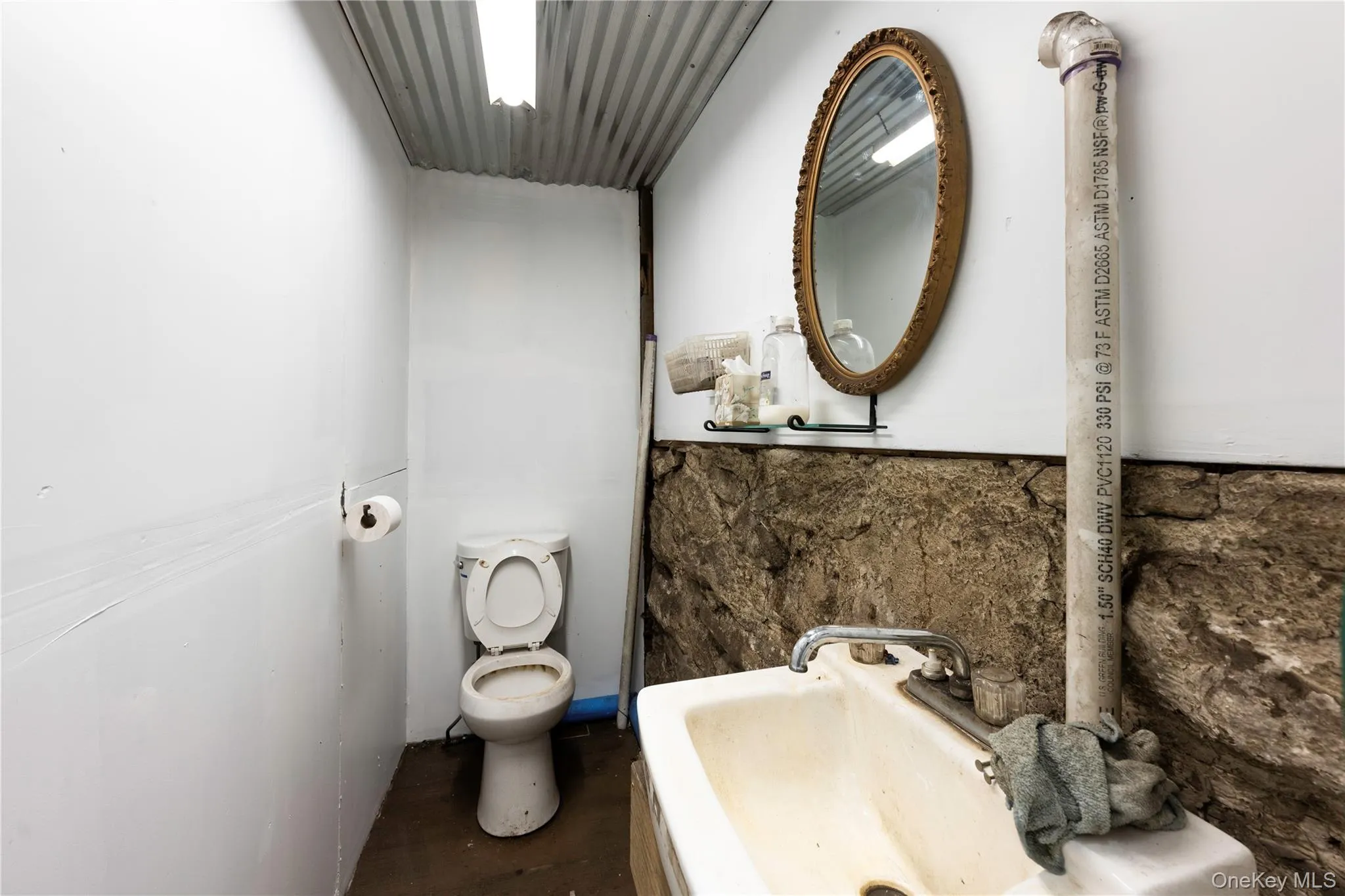 Half bathroom with toilet Half bathroom with toilet