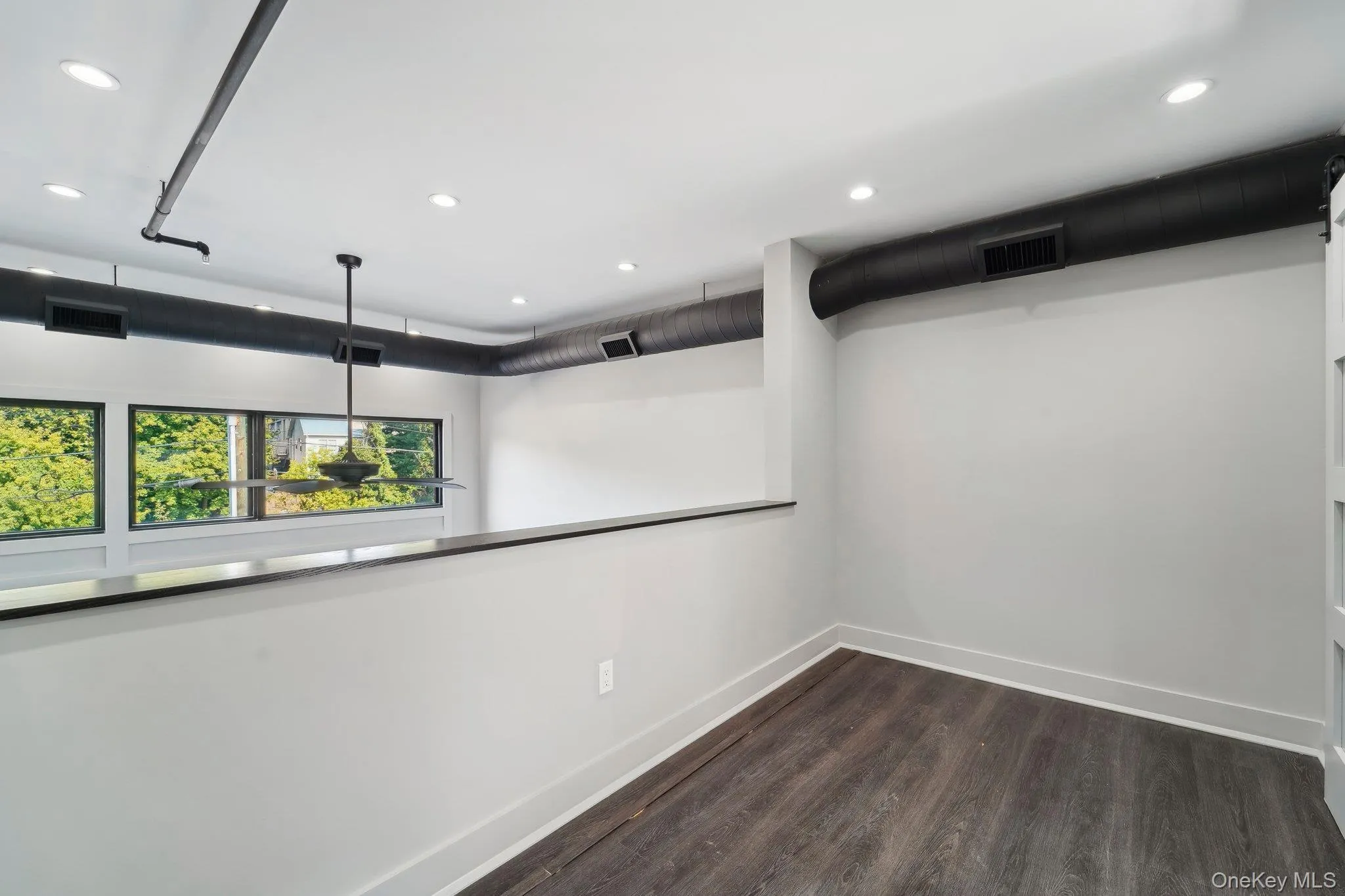 Office/Den featuring recessed lighting and dark wood-style flooring Office/Den featuring recessed lighting and dark wood-style flooring