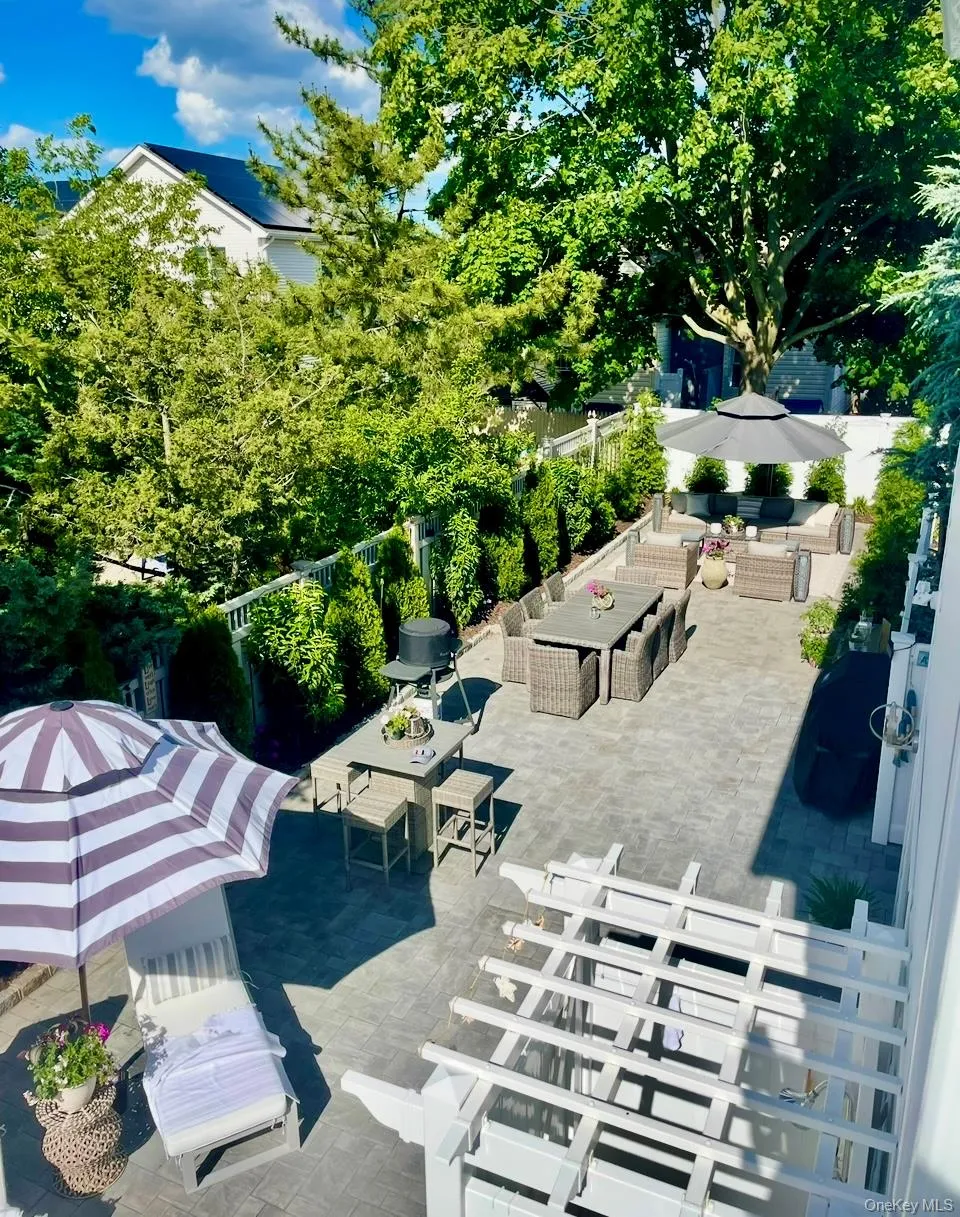View of patio / terrace with outdoor dining space and an outdoor hangout area View of patio / terrace with outdoor dining space and an outdoor hangout area