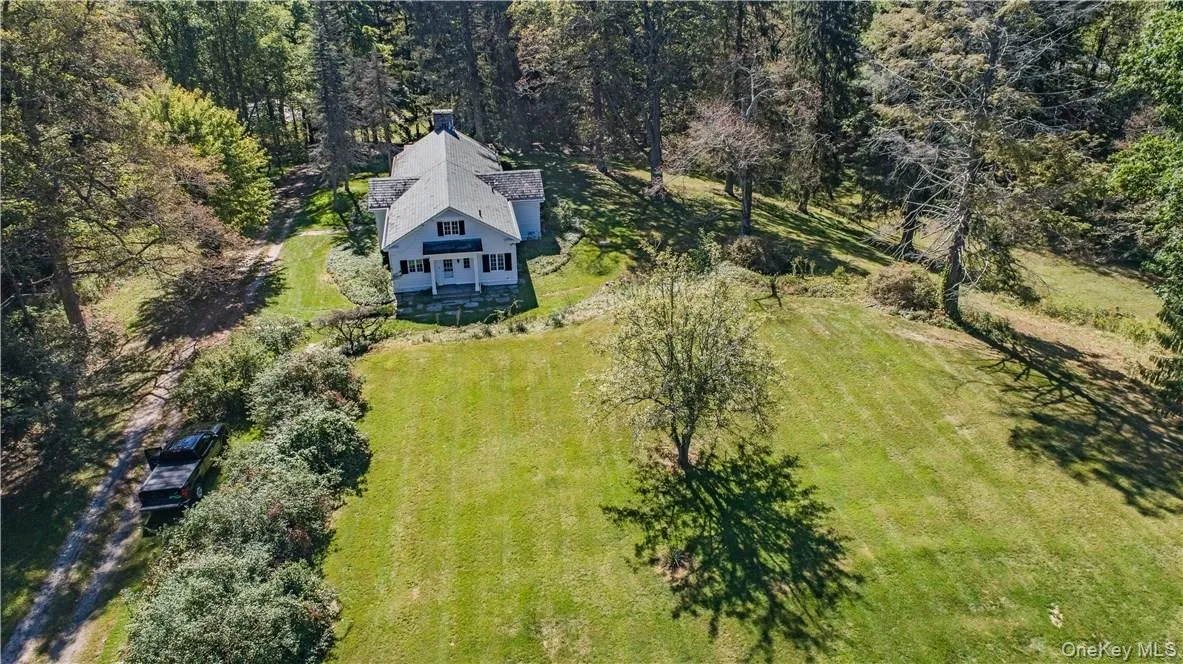 Verdant rolling lawns shaded by stately trees, sloping down to a maple sugar bush. Verdant rolling lawns shaded by stately trees, sloping down to a maple sugar bush.