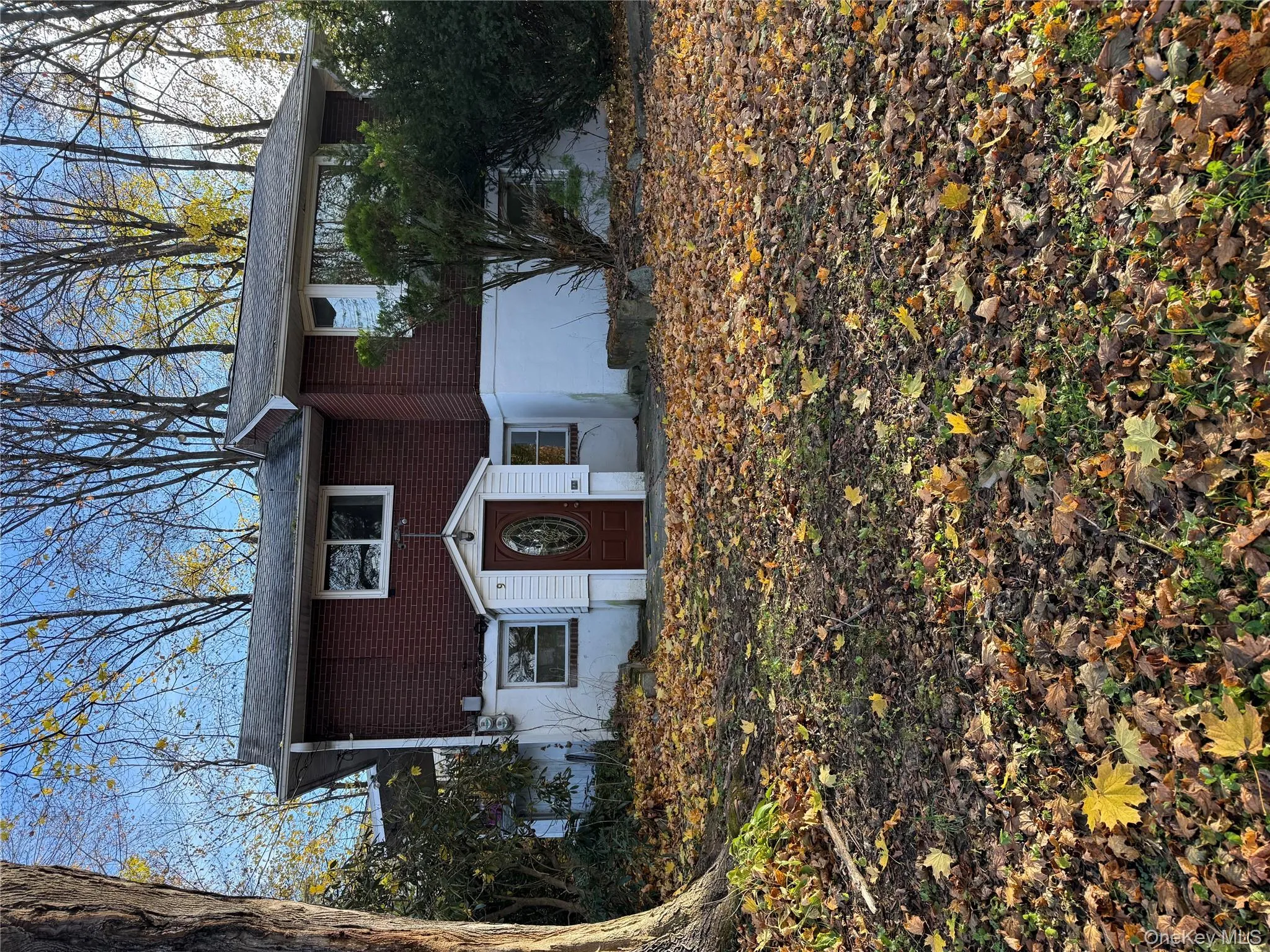 View of front of home featuring brick siding View of front of home featuring brick siding