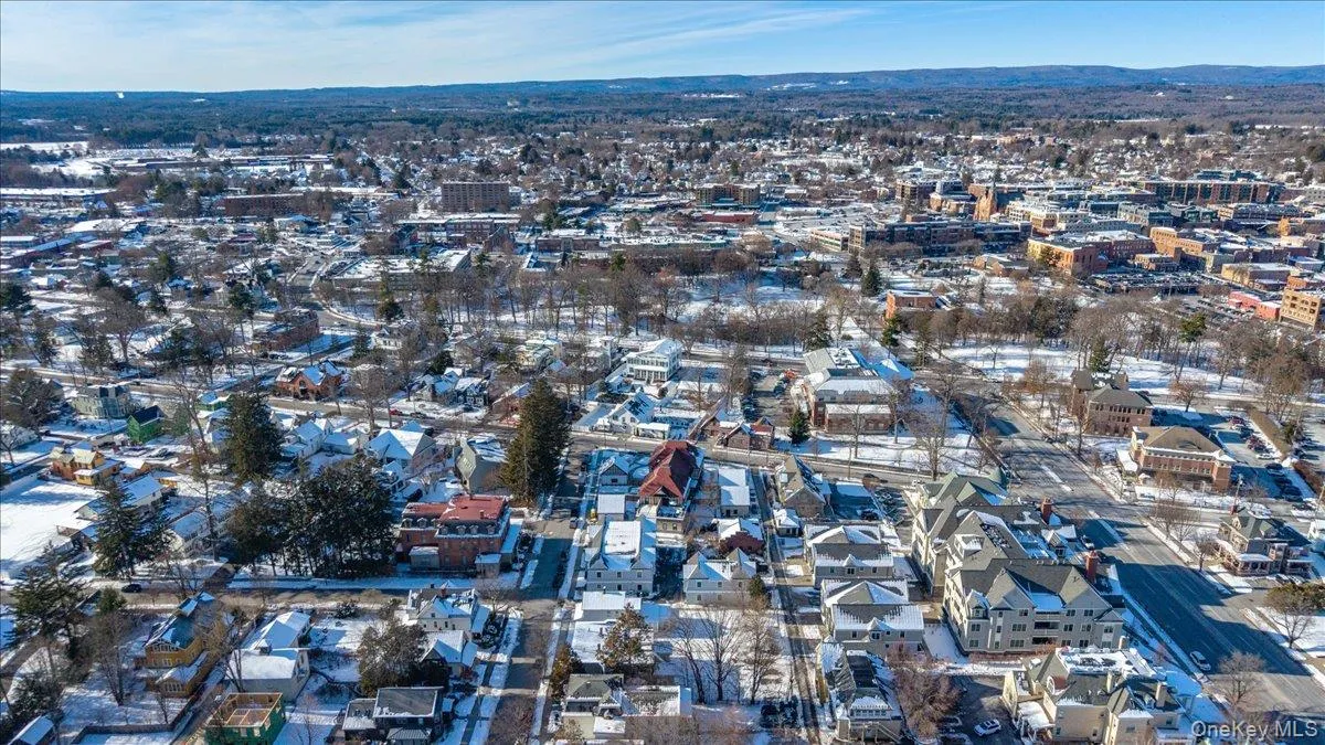 Aerial overview of property's location featuring nearby urban area Aerial overview of property's location featuring nearby urban area