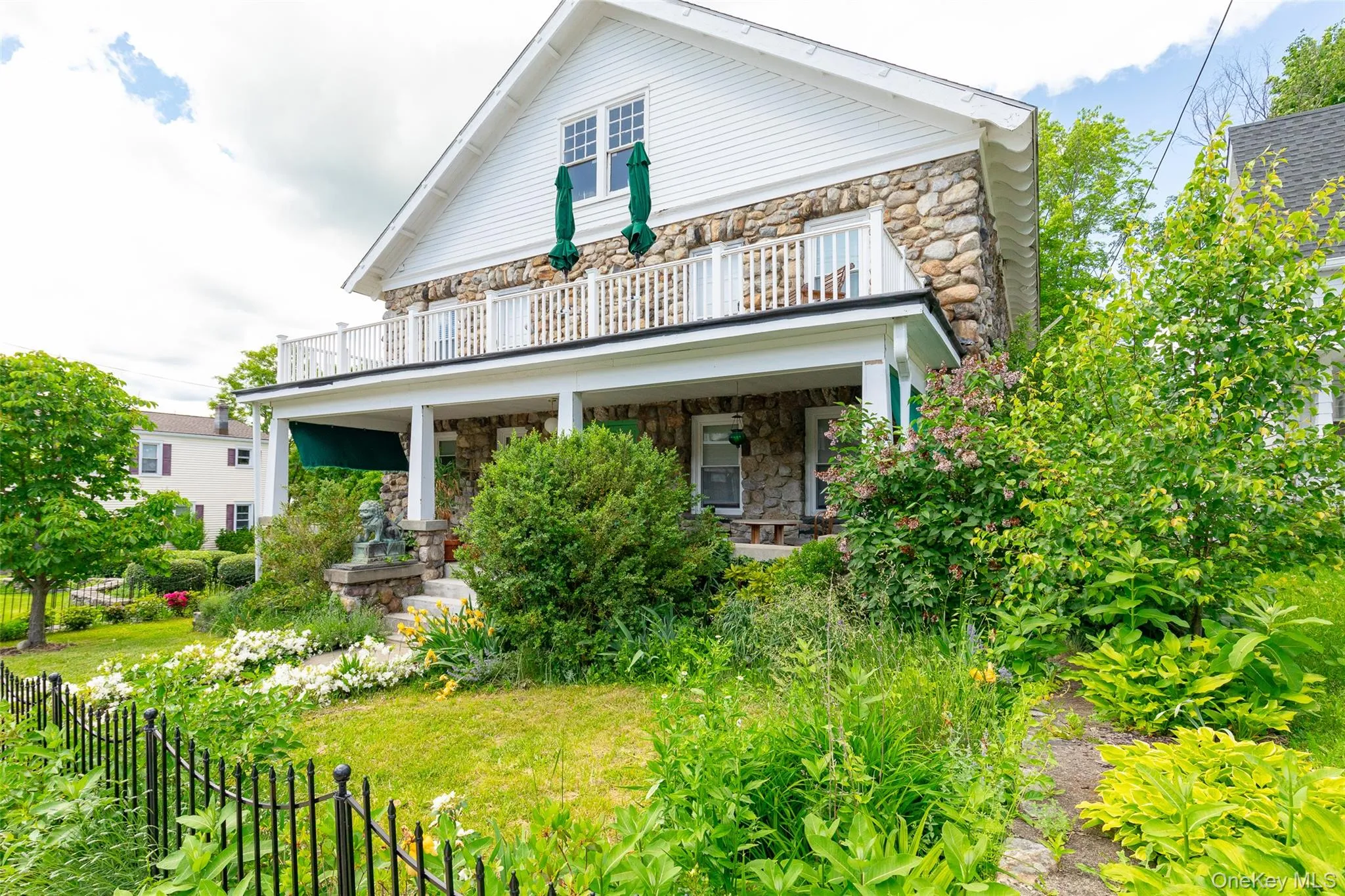 Back of house with stone siding Back of house with stone siding