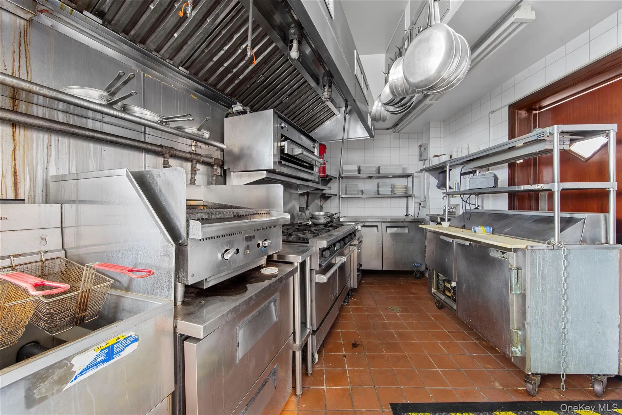 Kitchen featuring high end stainless steel range oven Kitchen featuring high end stainless steel range oven