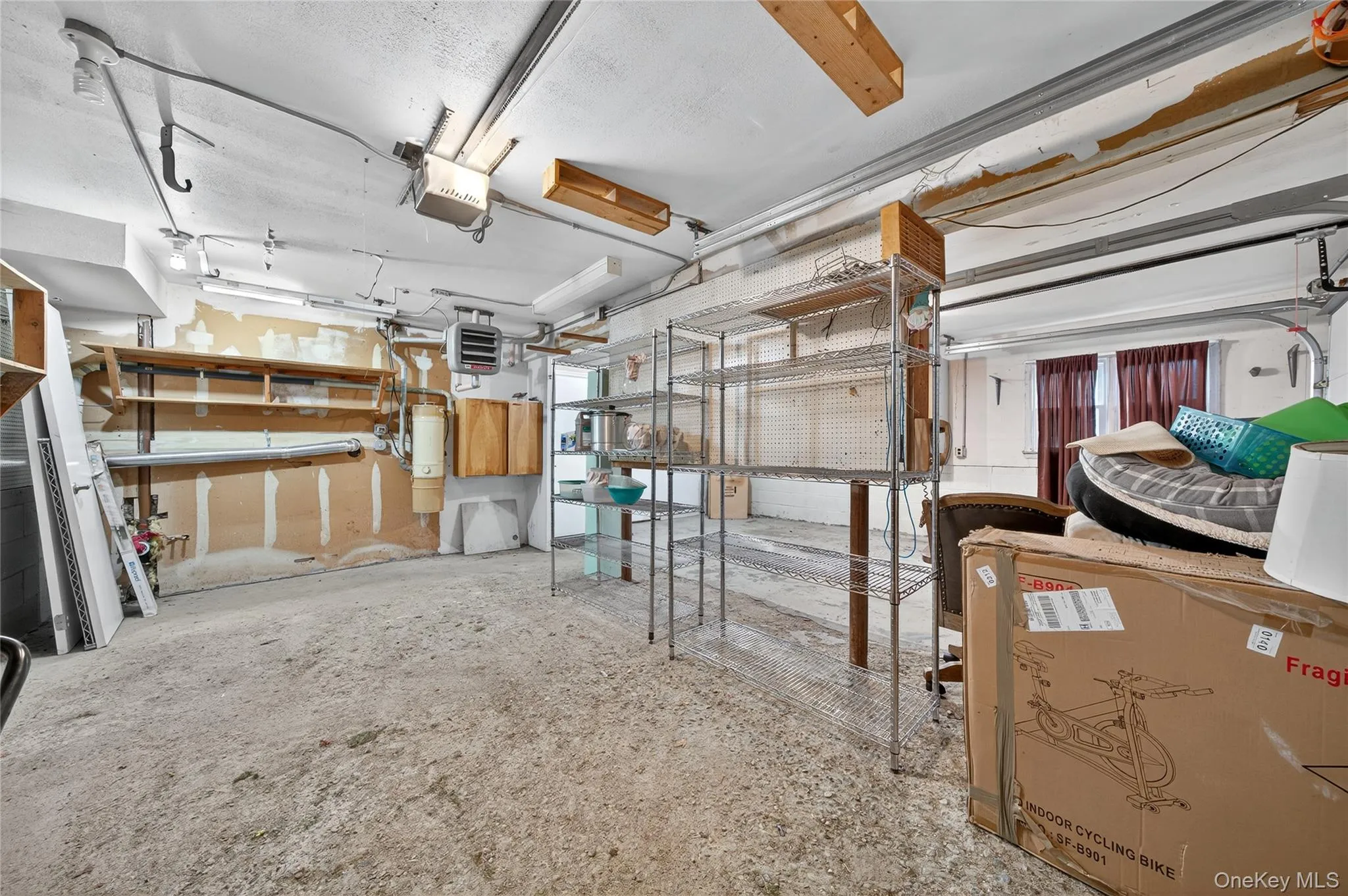 Garage with a heating unit and a garage door opener Garage with a heating unit and a garage door opener