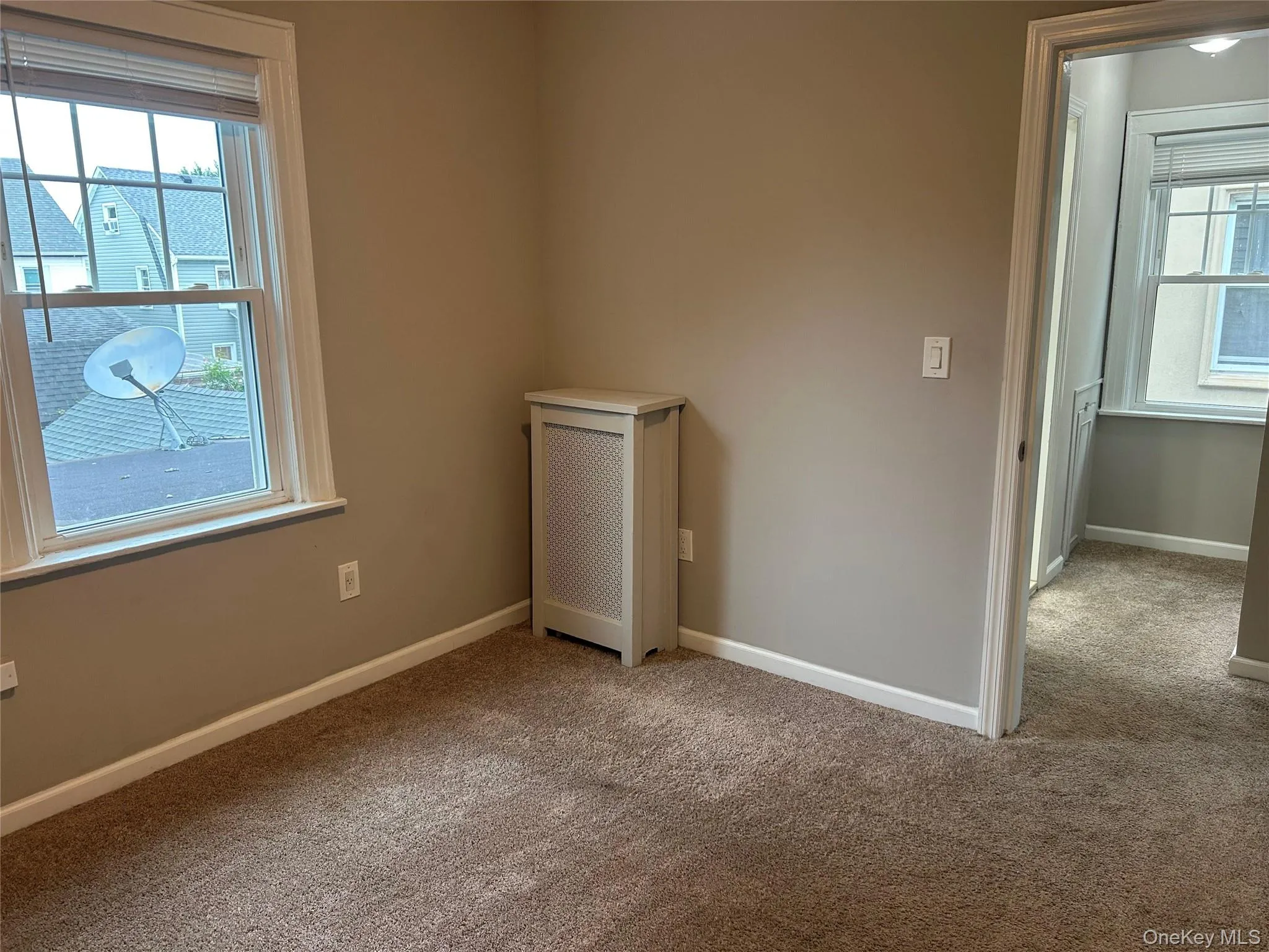 Spacious bedroom with ample natural light and good sized closet Spacious bedroom with ample natural light and good sized closet