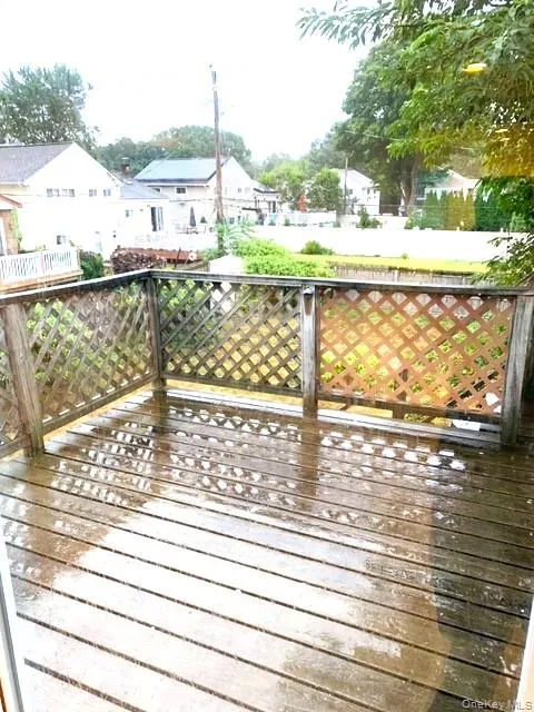 Wooden deck featuring a residential view Wooden deck featuring a residential view