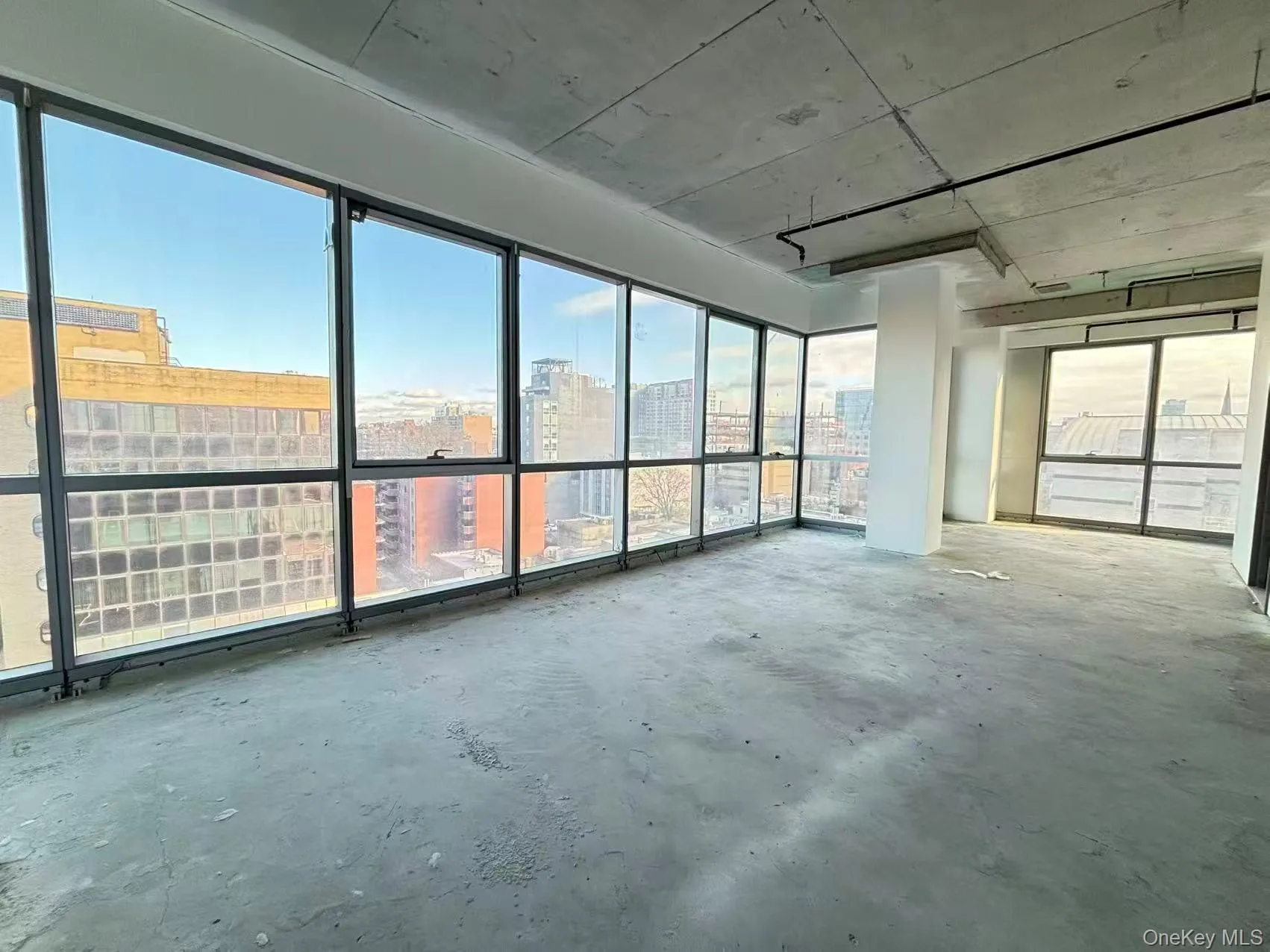 Unfurnished sunroom with a view of city Unfurnished sunroom with a view of city