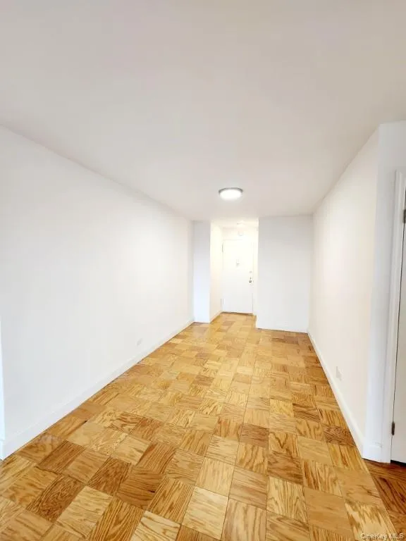 Unfurnished room featuring baseboards Unfurnished room featuring baseboards