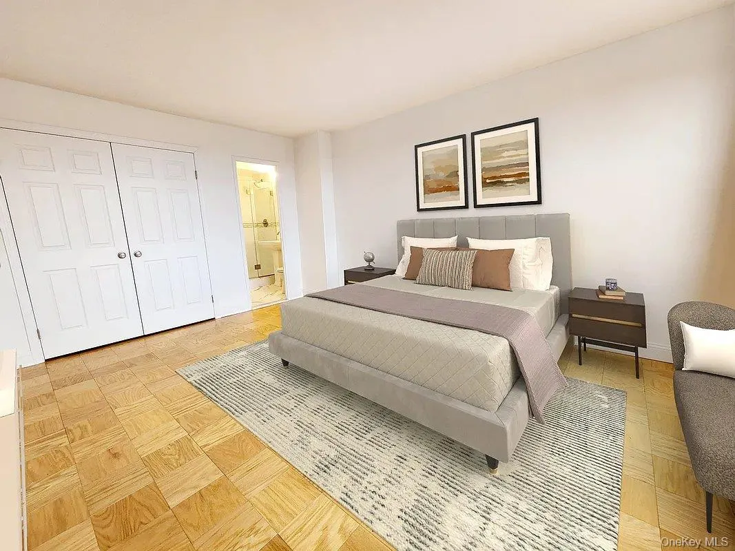 Bedroom with ensuite bathroom and a closet Bedroom with ensuite bathroom and a closet