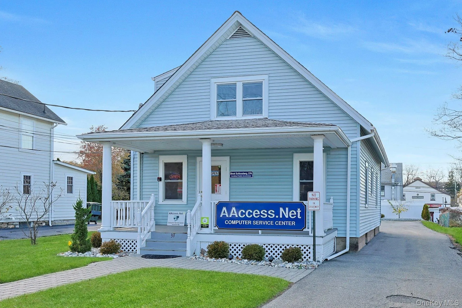 Bungalow featuring a porch and a front yard Bungalow featuring a porch and a front yard
