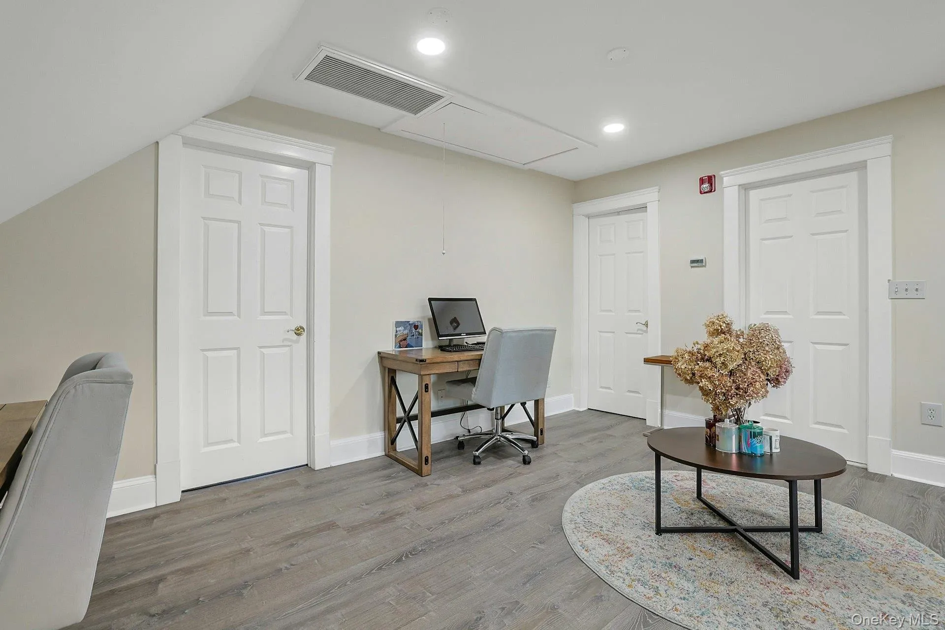 Office area with attic access, wood finished floors, and recessed lighting Office area with attic access, wood finished floors, and recessed lighting