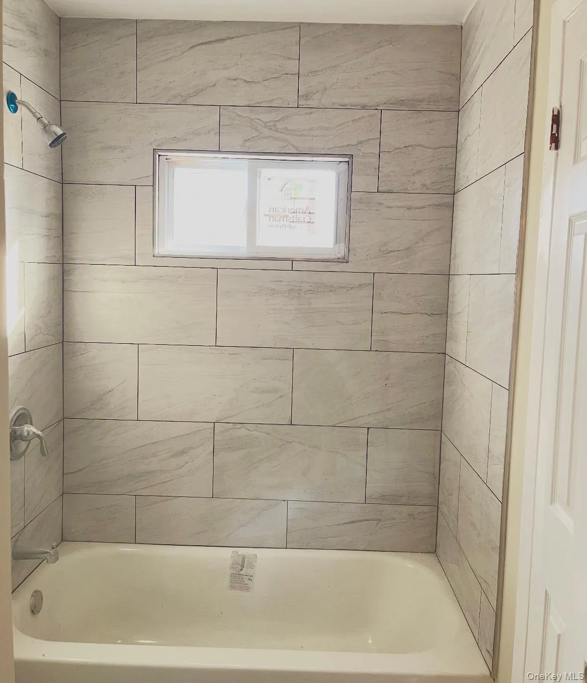 Full bath with tub / shower combination Full bath with tub / shower combination