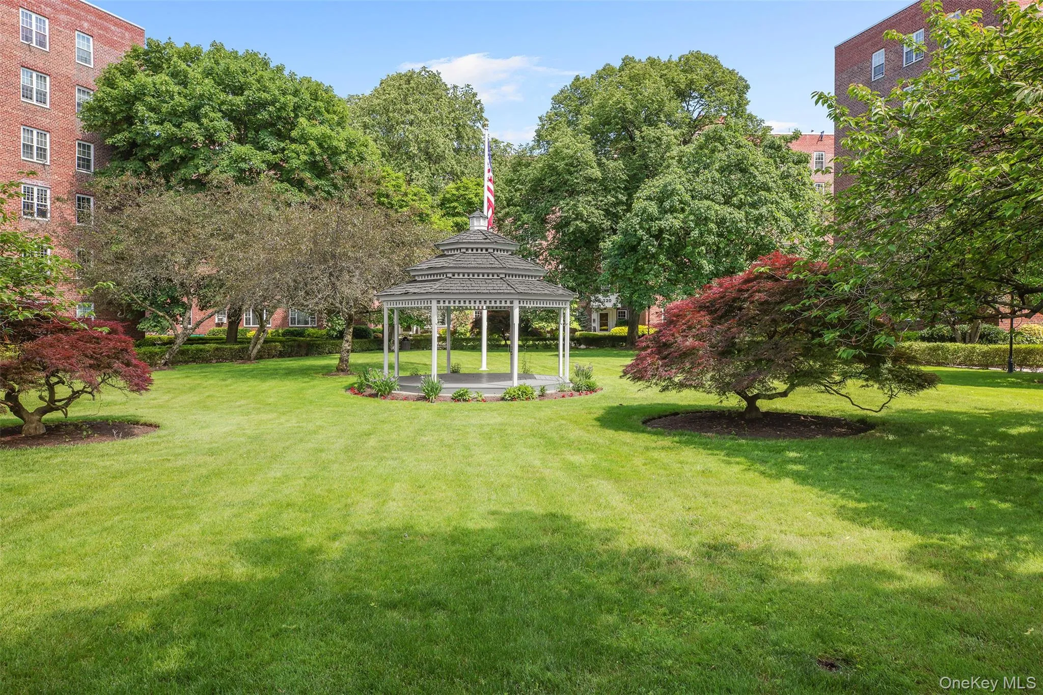 View of home's community with a gazebo and a yard View of home's community with a gazebo and a yard
