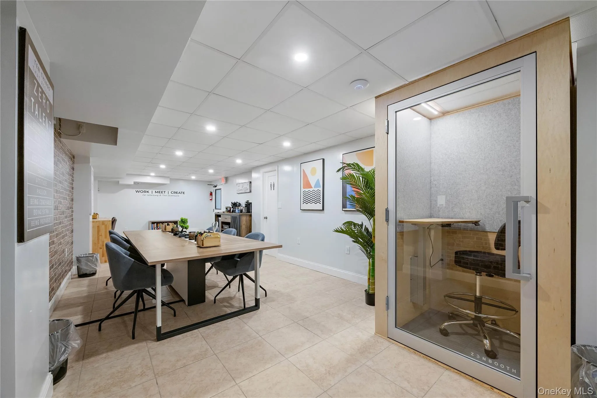 Dining space with recessed lighting, light tile patterned floors, and a drop ceiling Dining space with recessed lighting, light tile patterned floors, and a drop ceiling