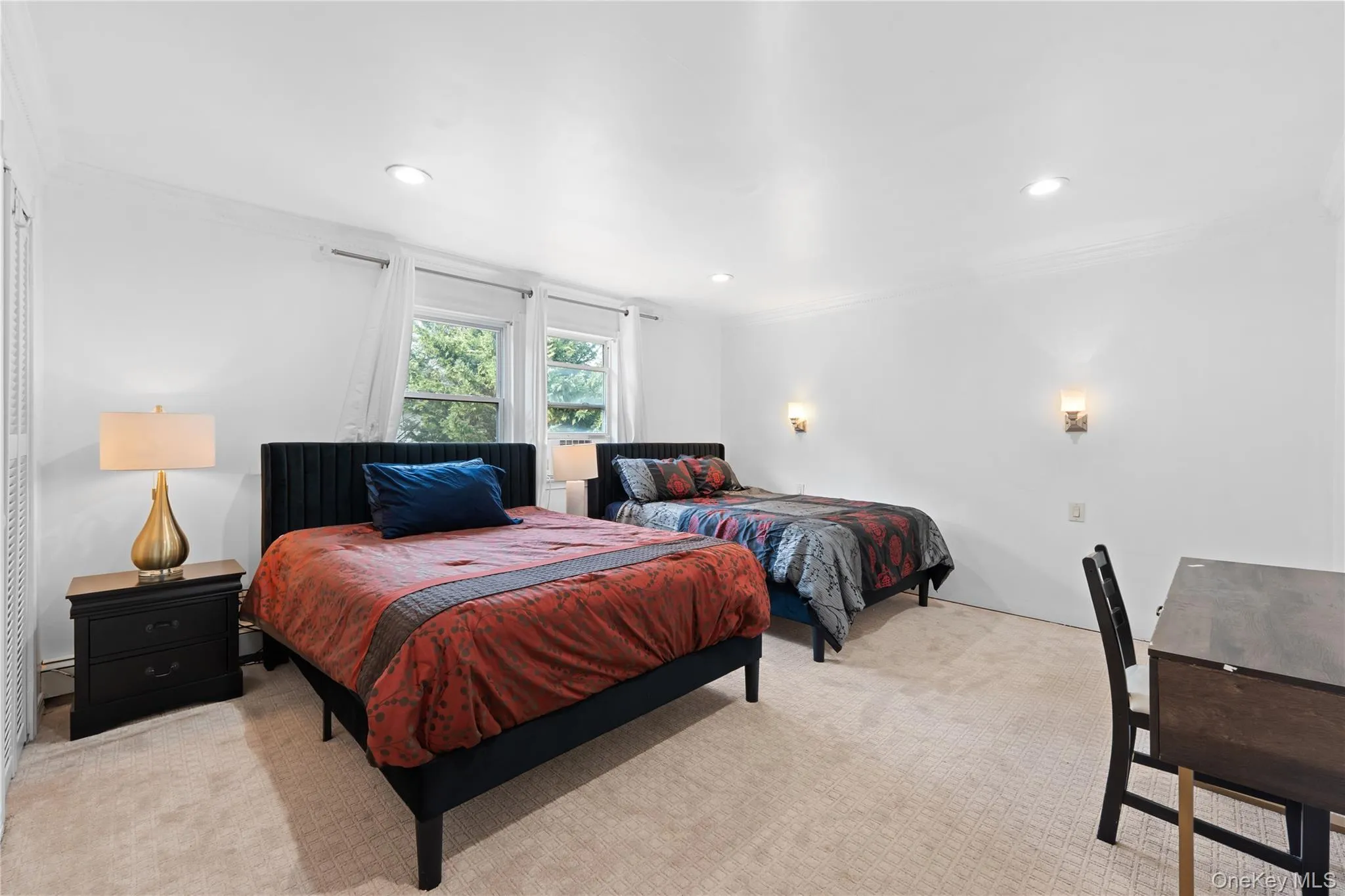 Bedroom featuring crown molding, carpet, and recessed lighting Bedroom featuring crown molding, carpet, and recessed lighting