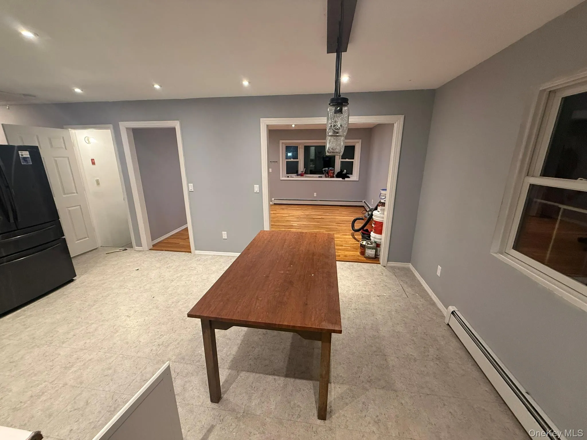 Unfurnished dining area featuring a baseboard heating unit and recessed lighting Unfurnished dining area featuring a baseboard heating unit and recessed lighting