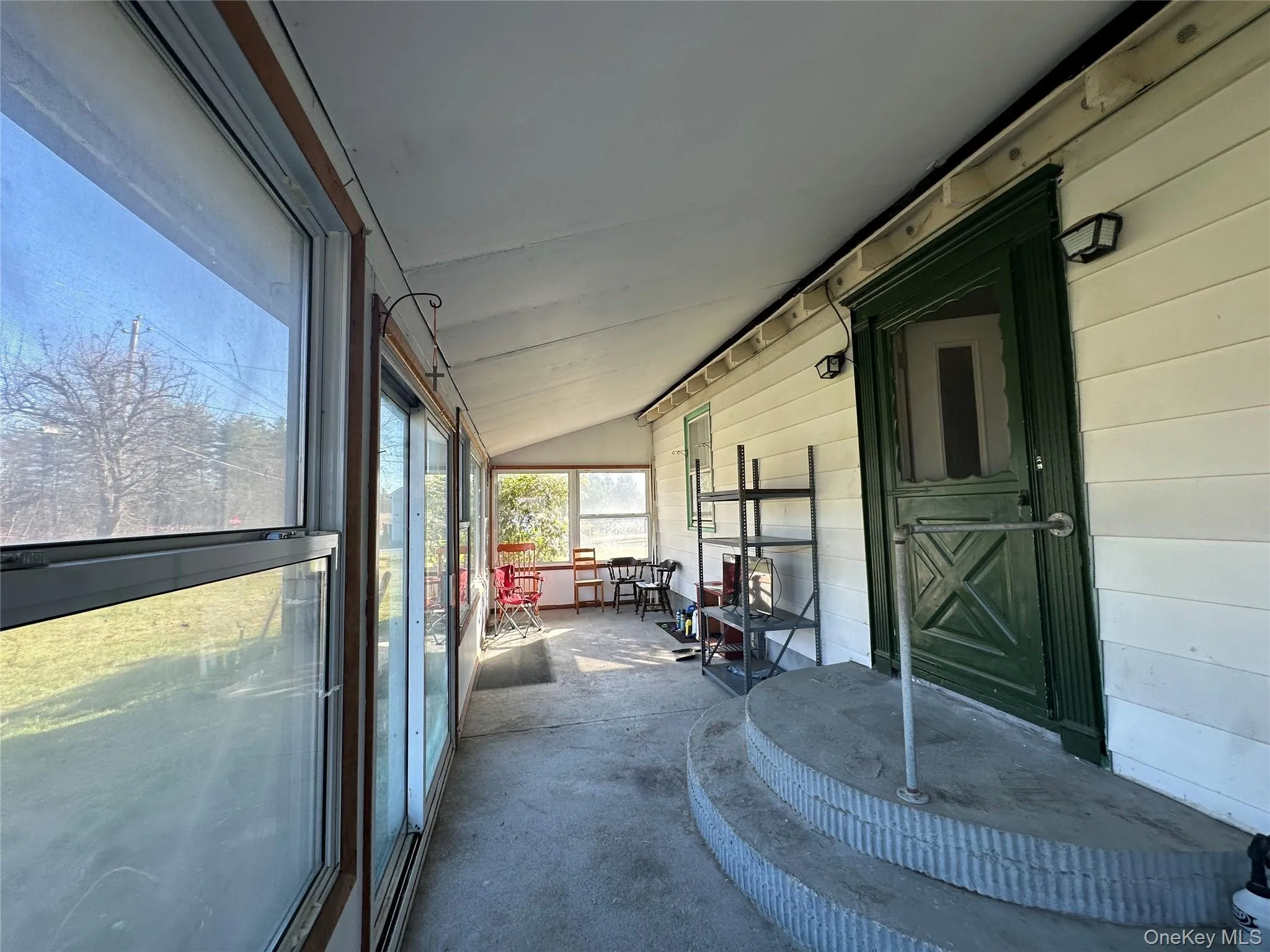 Sunroom with lofted ceiling Sunroom with lofted ceiling