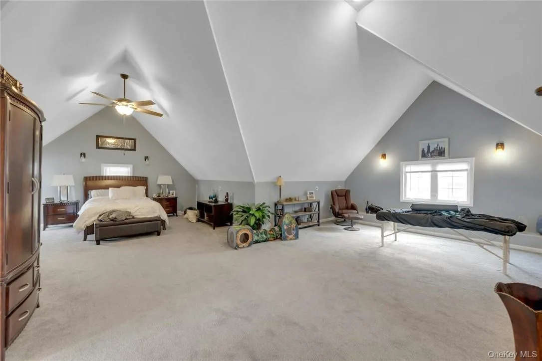 Flexible 2nd floor family room or master bedroom suite showing vaulted ceilings Flexible 2nd floor family room or master bedroom suite showing vaulted ceilings