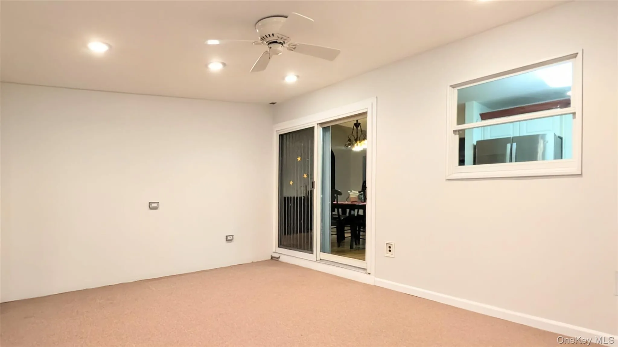 Unfurnished room featuring carpet, recessed lighting, and a ceiling fan Unfurnished room featuring carpet, recessed lighting, and a ceiling fan