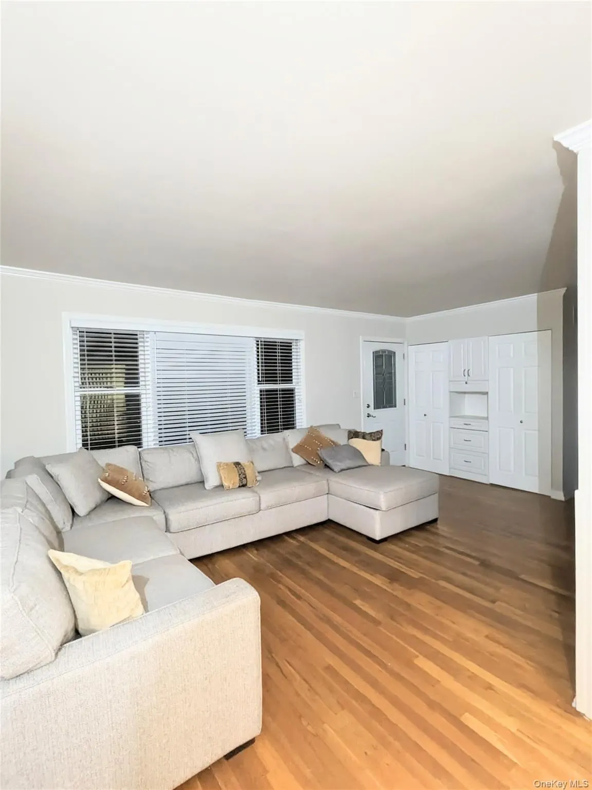 Living room featuring light wood finished floors Living room featuring light wood finished floors