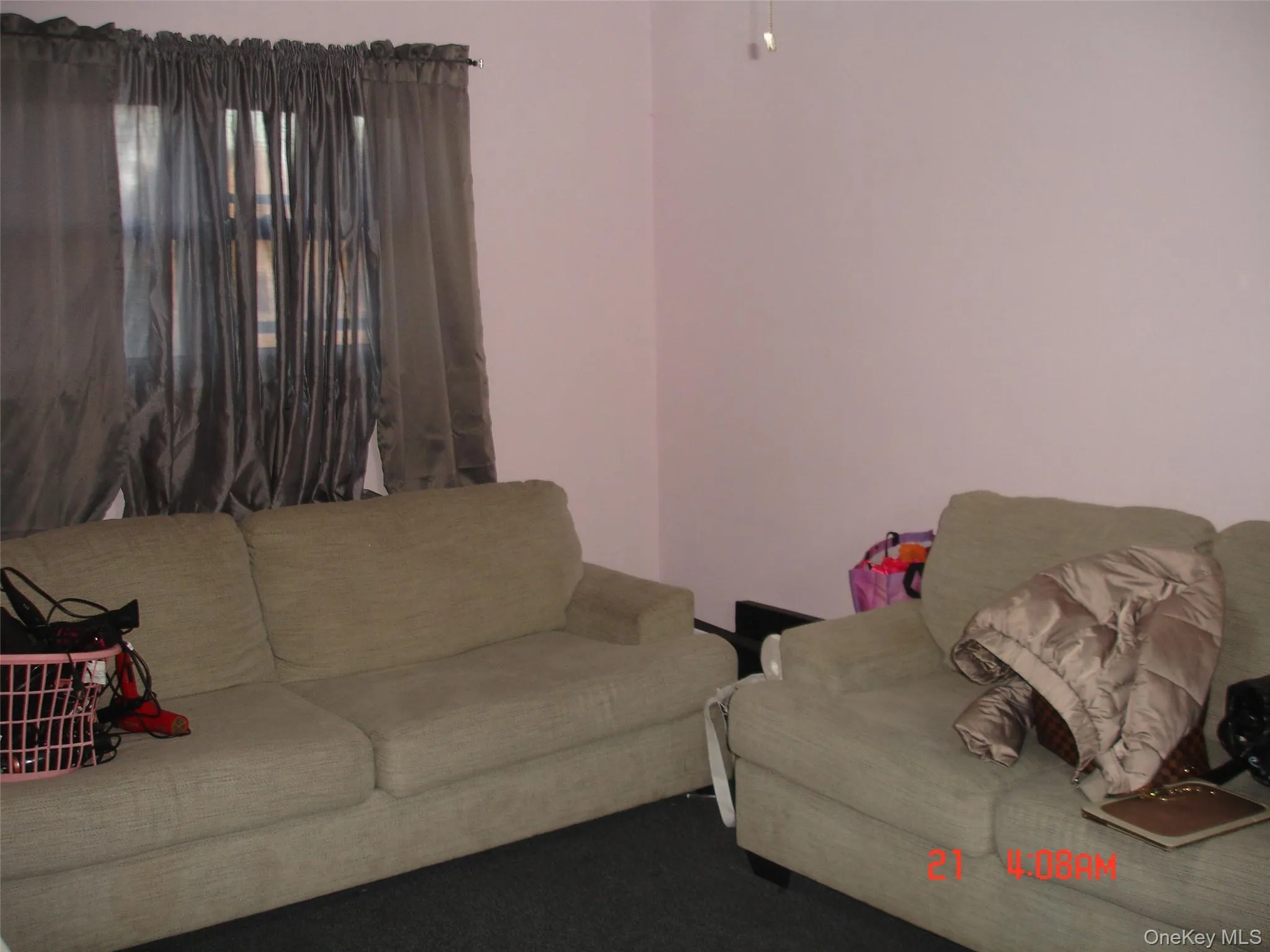 Living area featuring carpet flooring Living area featuring carpet flooring