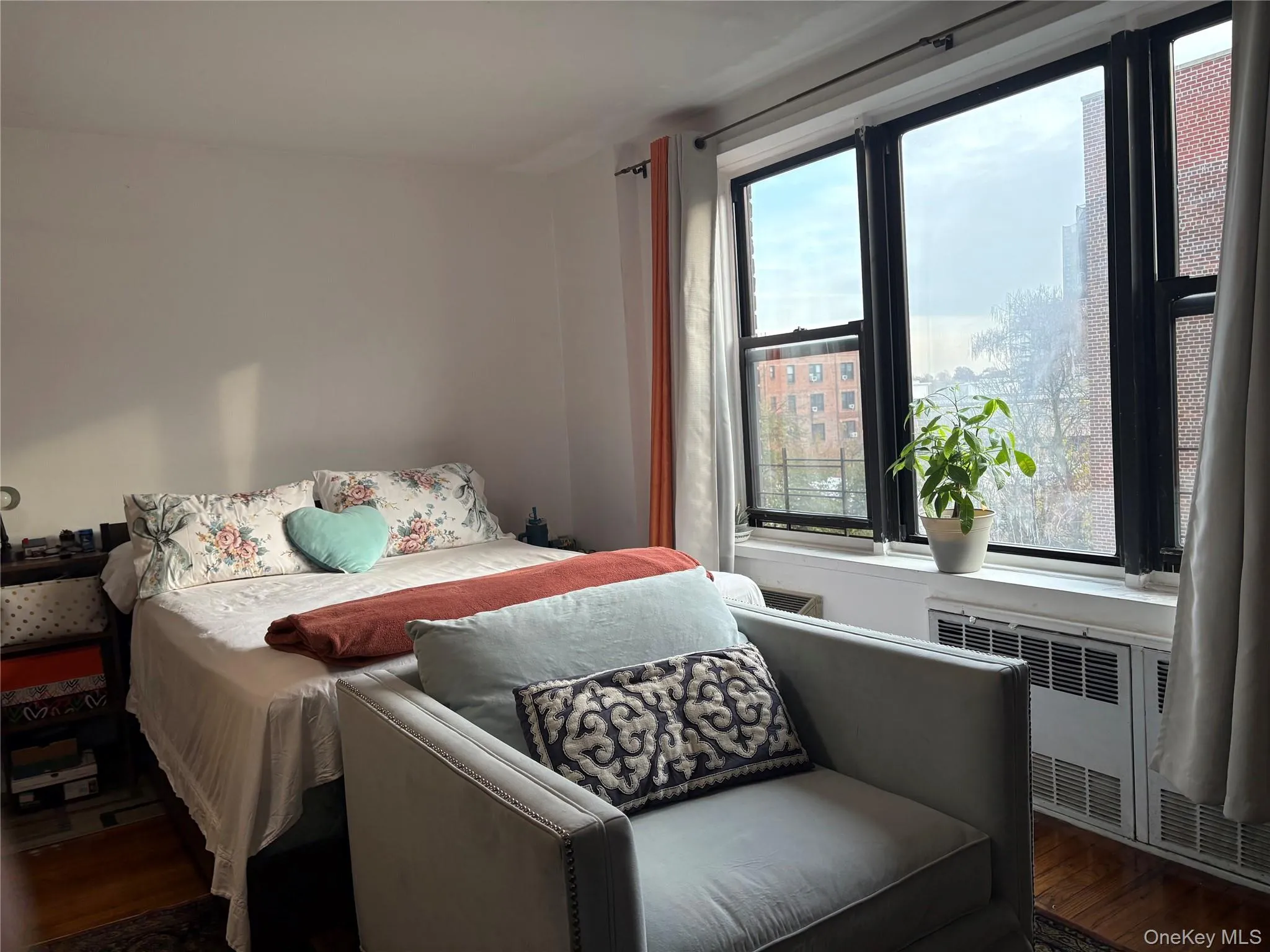 Bedroom featuring wood finished floors Bedroom featuring wood finished floors