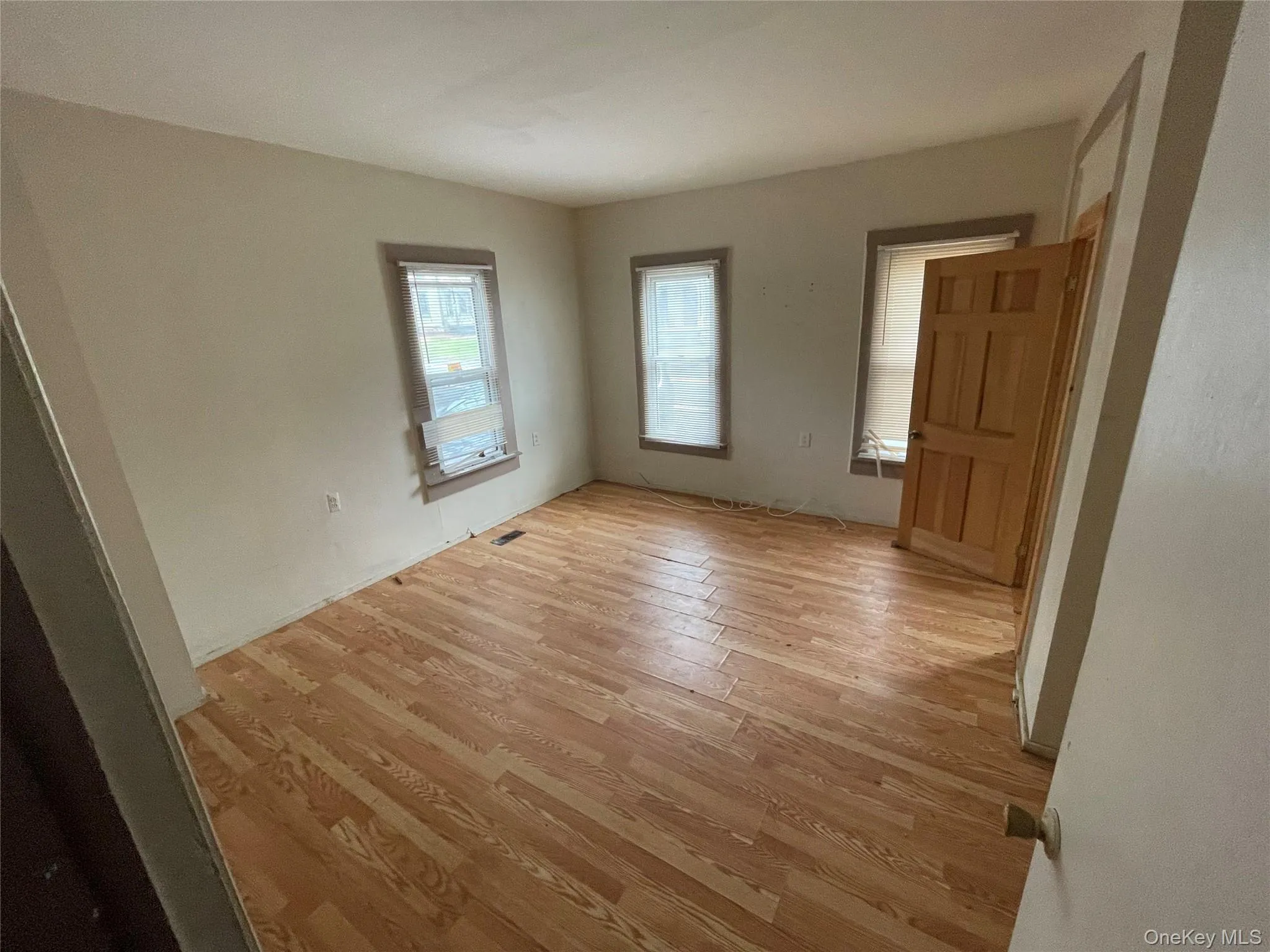 Empty room featuring light wood-style floors Empty room featuring light wood-style floors