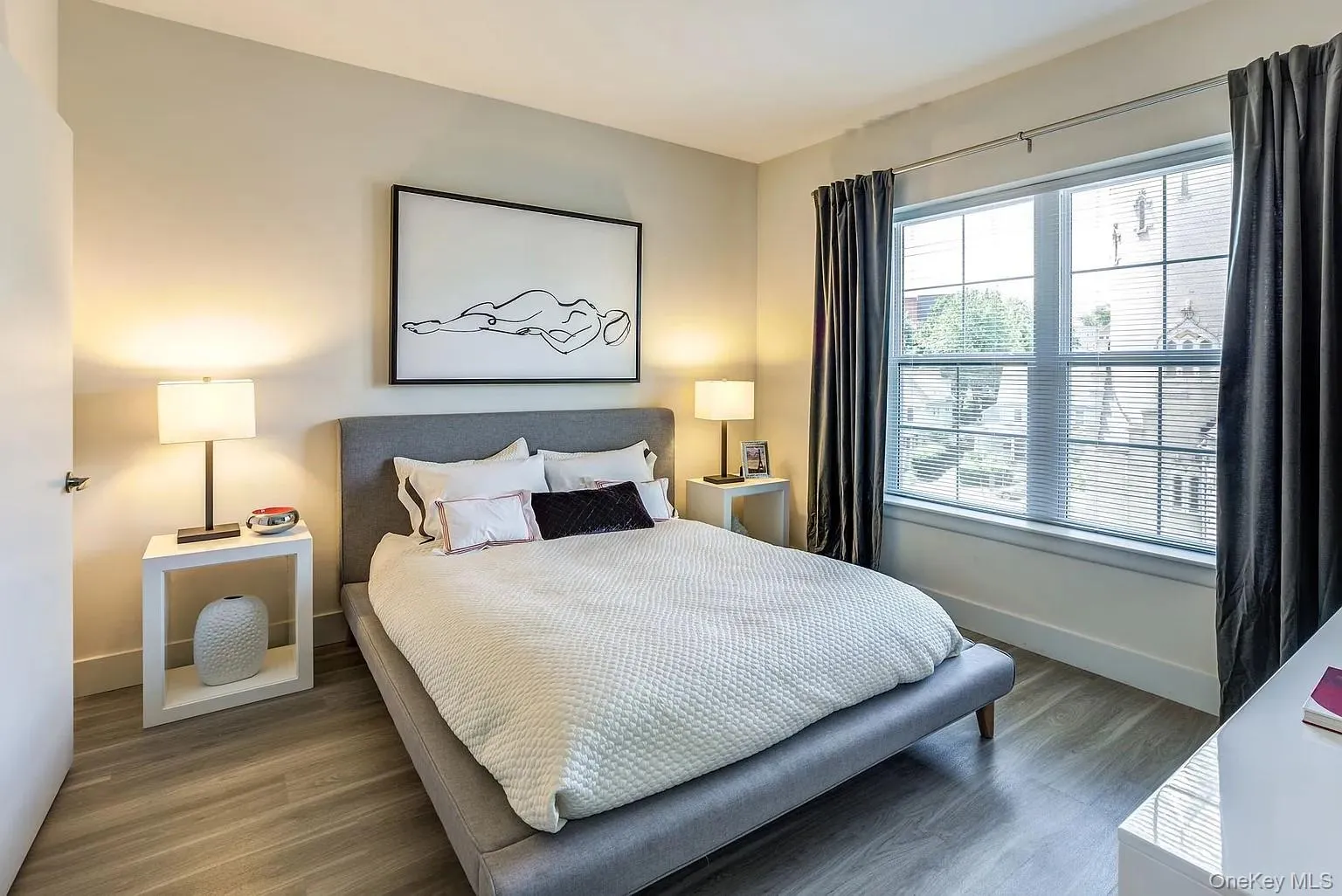 Bedroom with wood finished floors Bedroom with wood finished floors