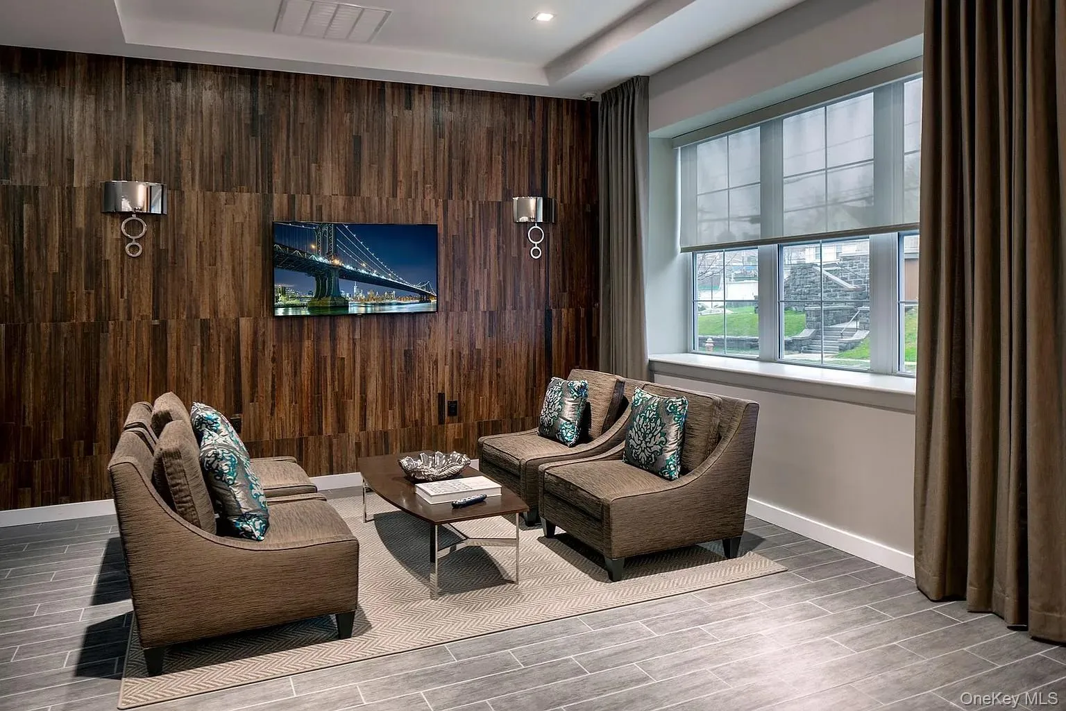 Sitting room with wood walls and recessed lighting Sitting room with wood walls and recessed lighting