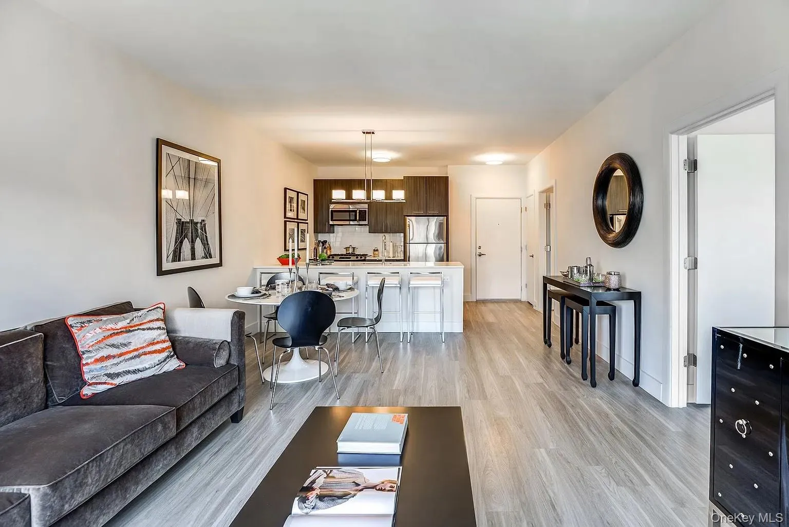 Living area featuring light wood-type flooring Living area featuring light wood-type flooring