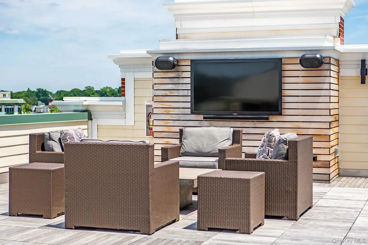 View of patio featuring an outdoor hangout area and a rooftop deck View of patio featuring an outdoor hangout area and a rooftop deck
